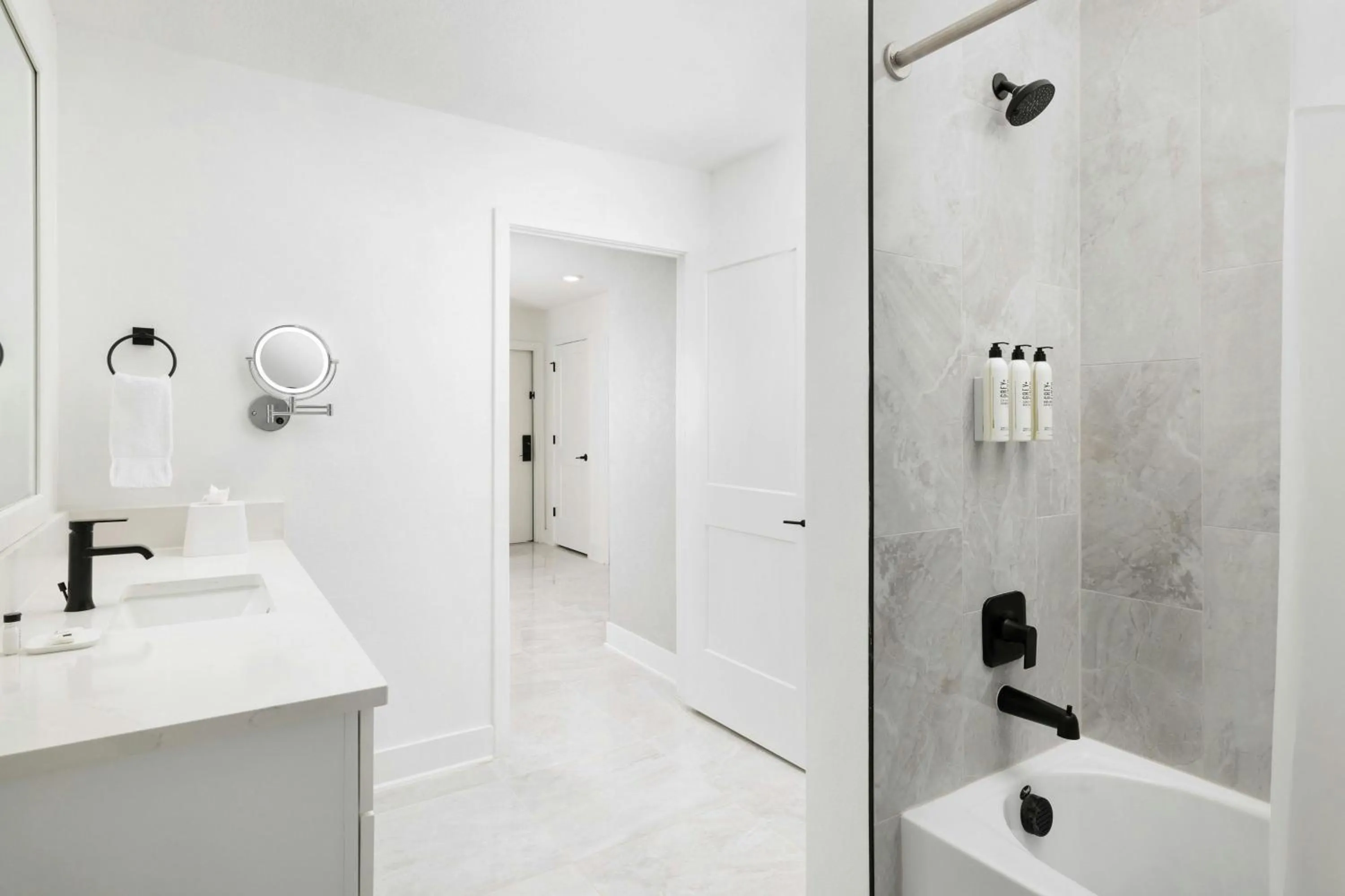 Bathroom in Villatel Orlando Resort, Apartments by Marriott Bonvoy