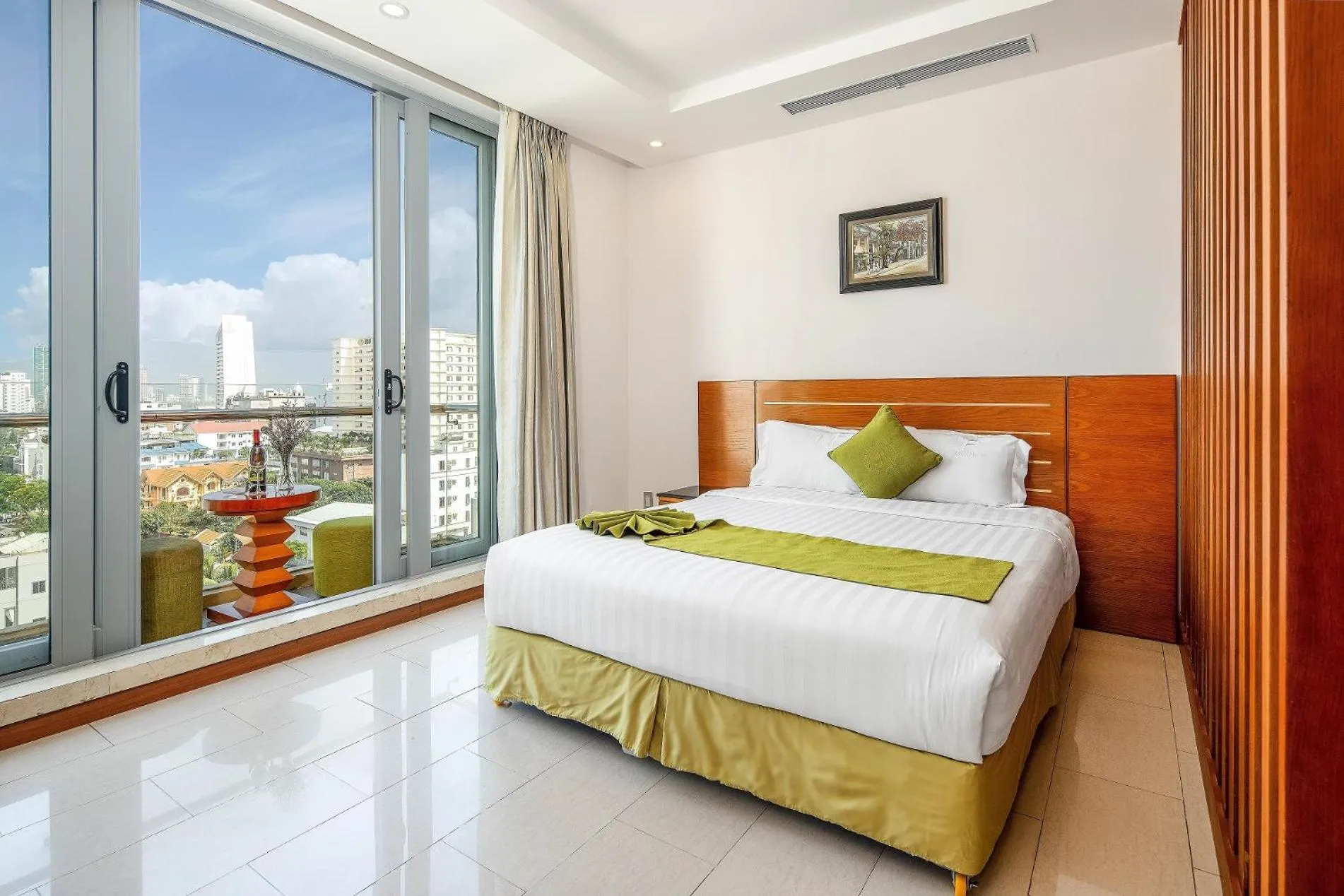 Bed in Richico Apartments And Hotel