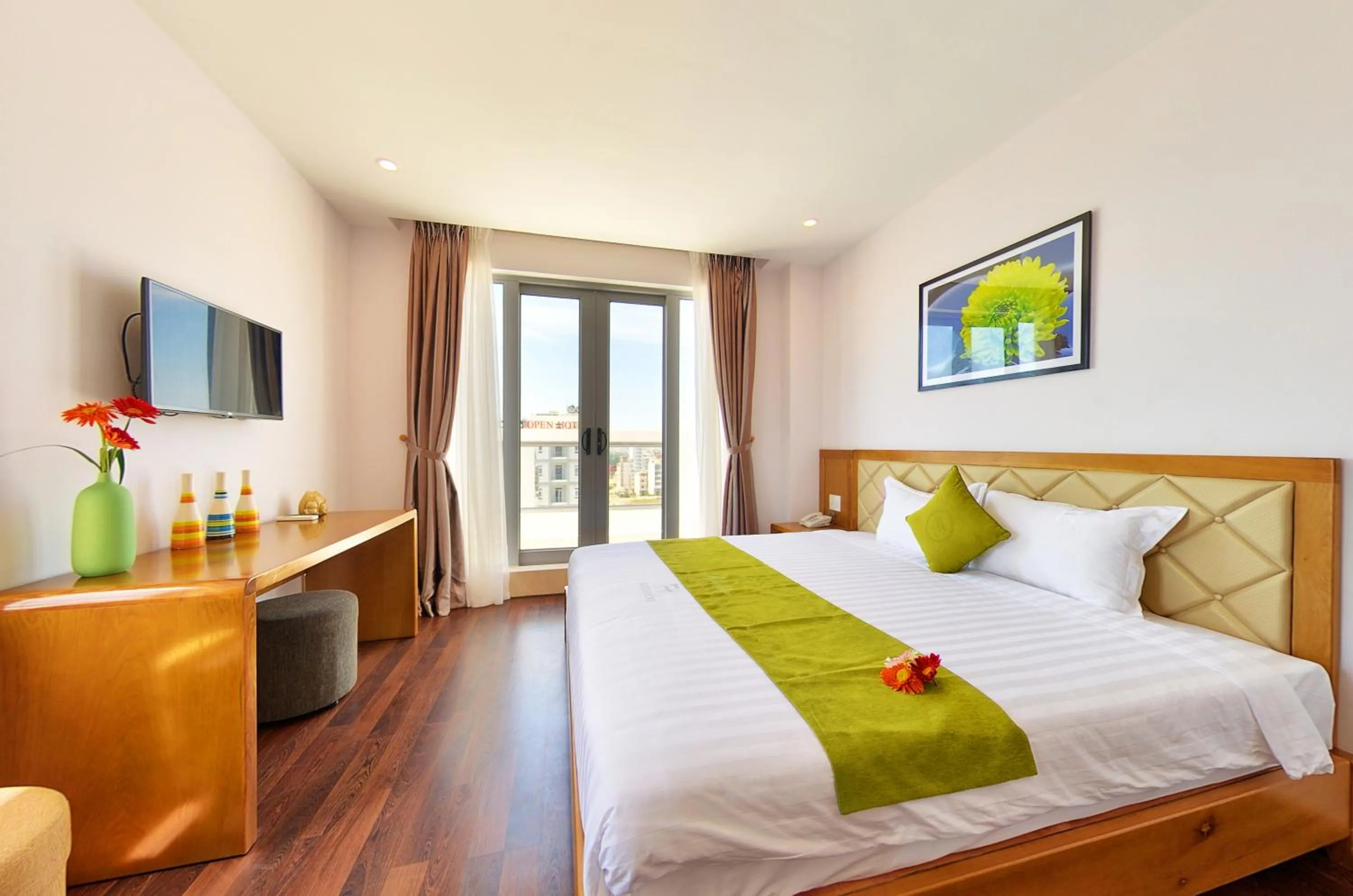 Bed in Richico Apartments And Hotel