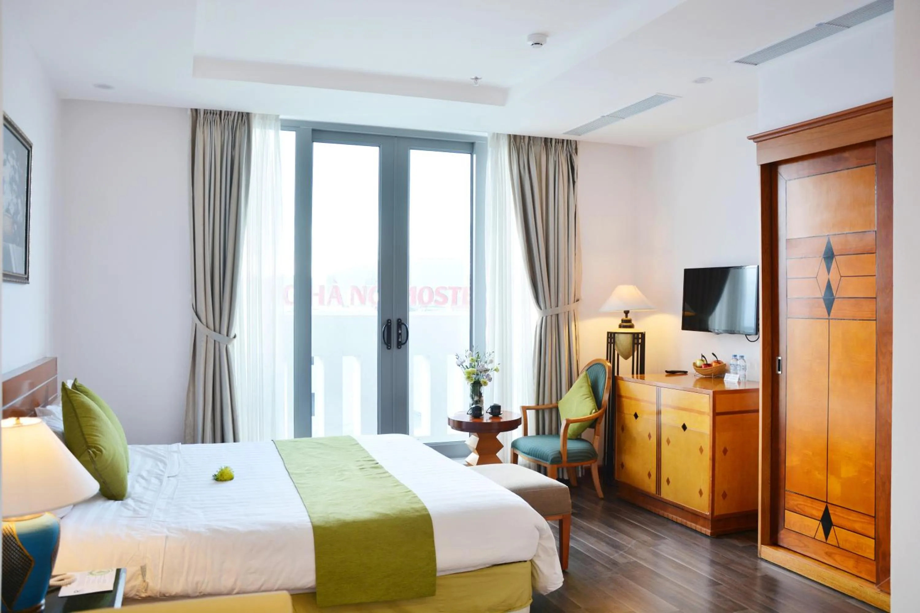 Bed in Richico Apartments And Hotel