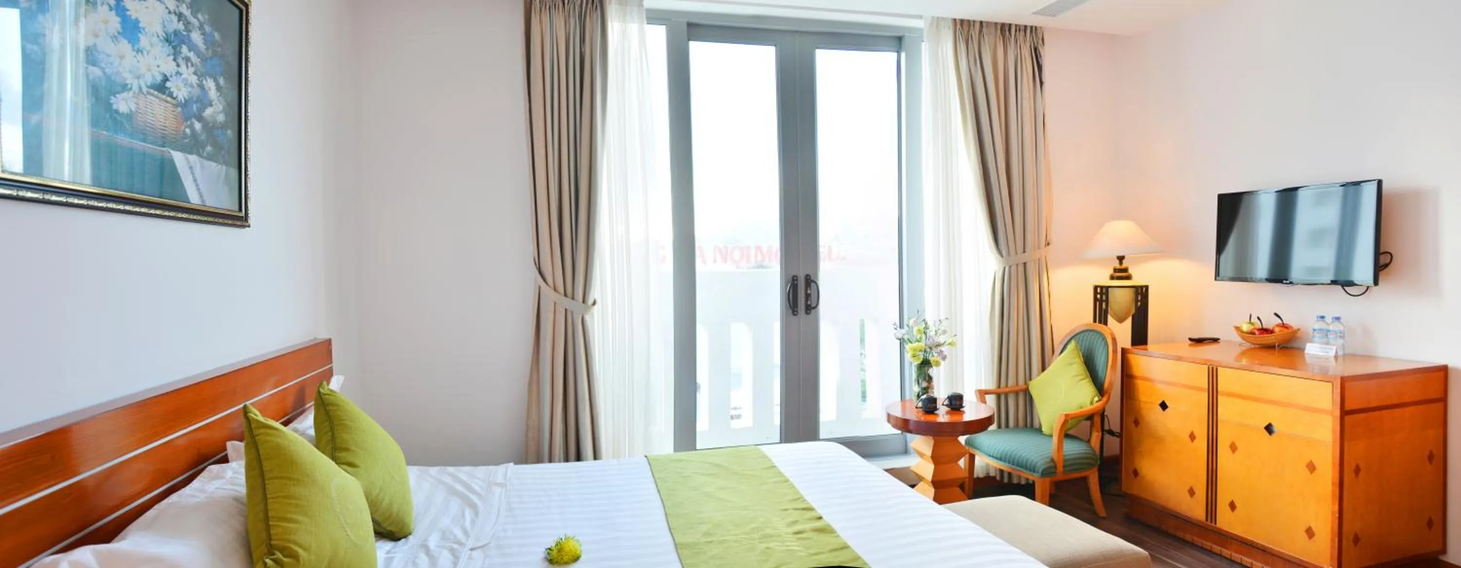 Bed in Richico Apartments And Hotel