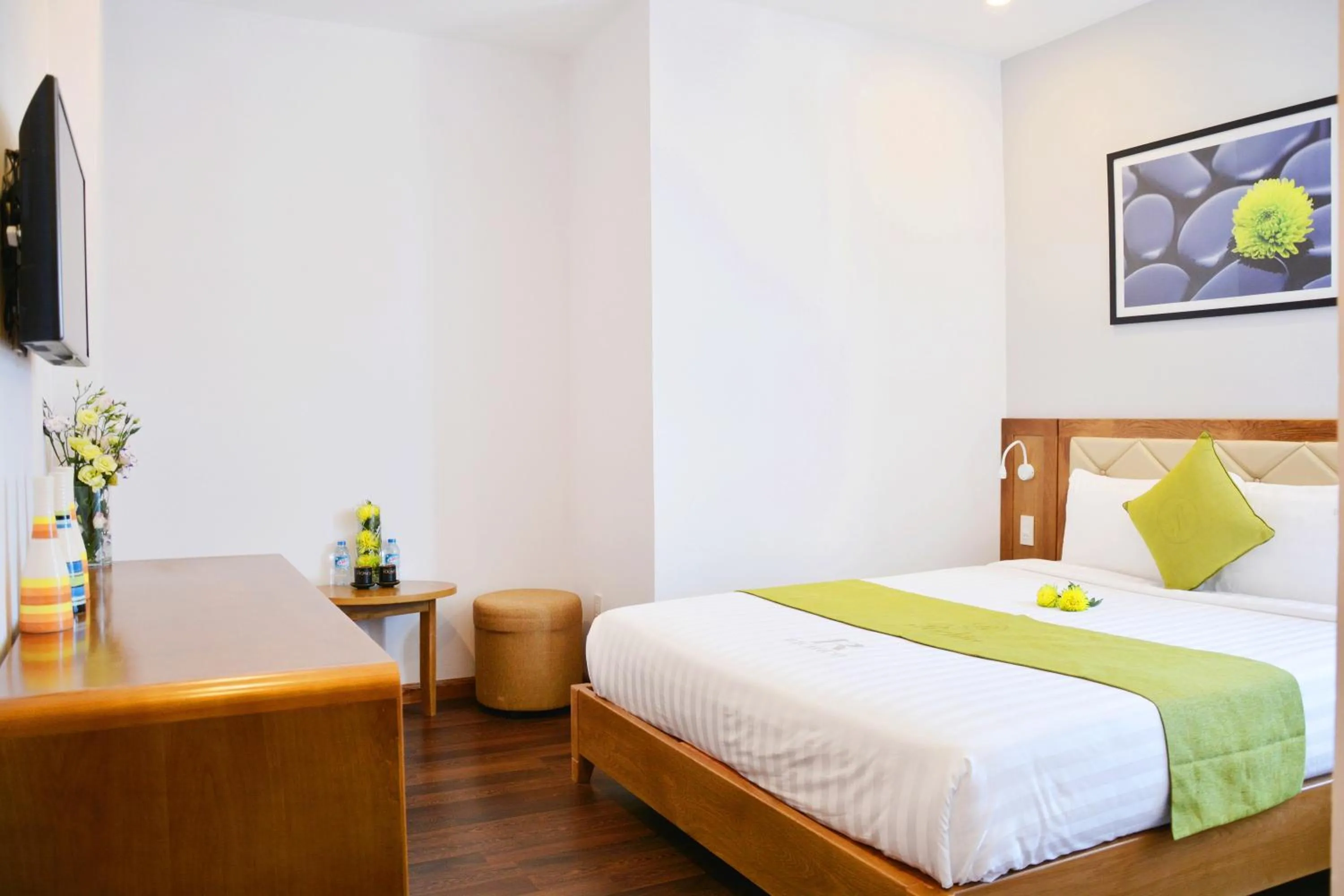 Bed in Richico Apartments And Hotel