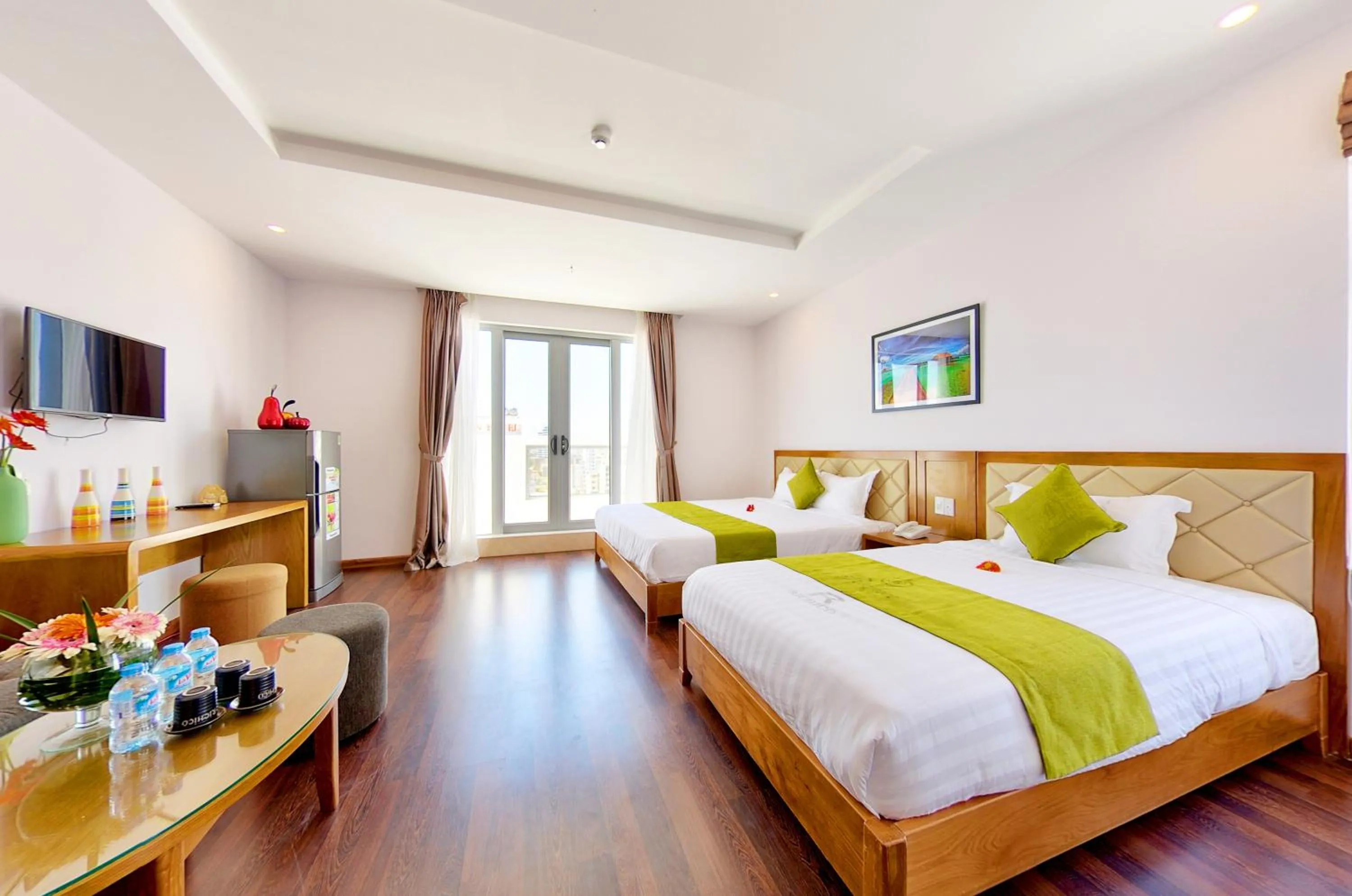 Bed in Richico Apartments And Hotel