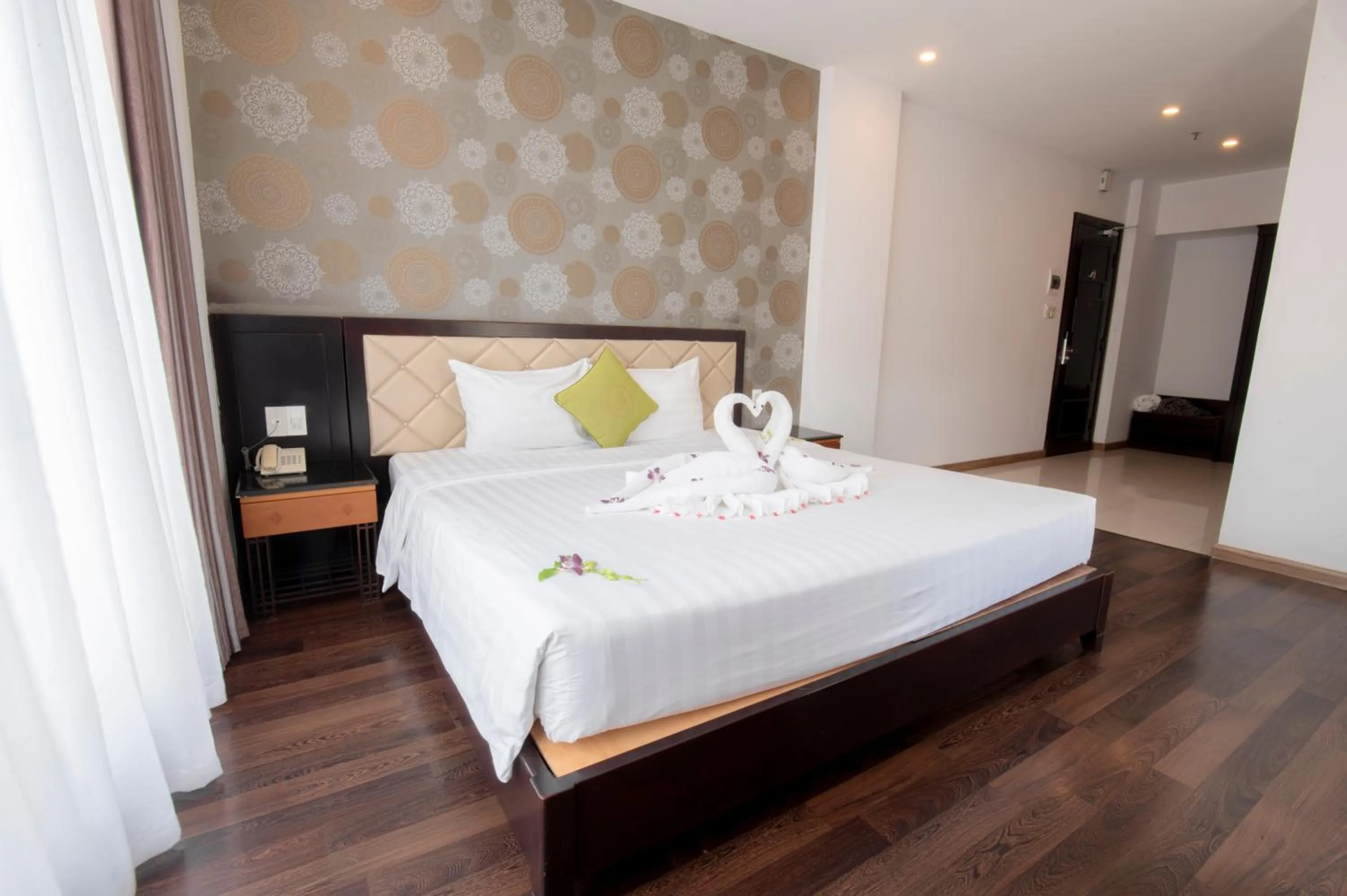 Bed in Richico Apartments And Hotel