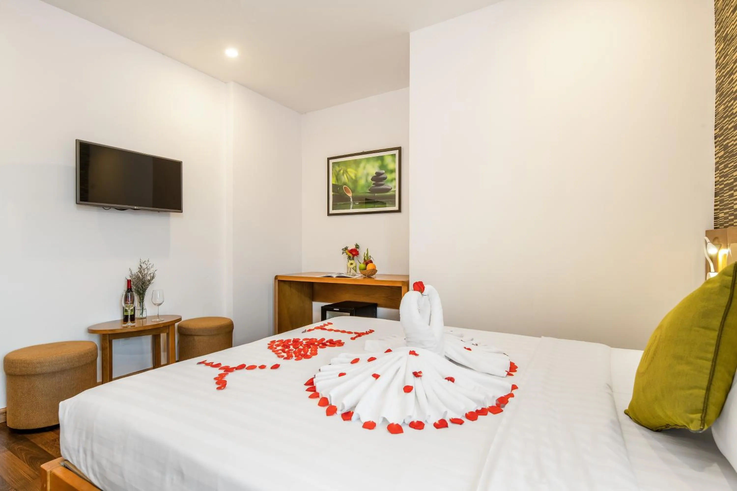 Bed in Richico Apartments And Hotel