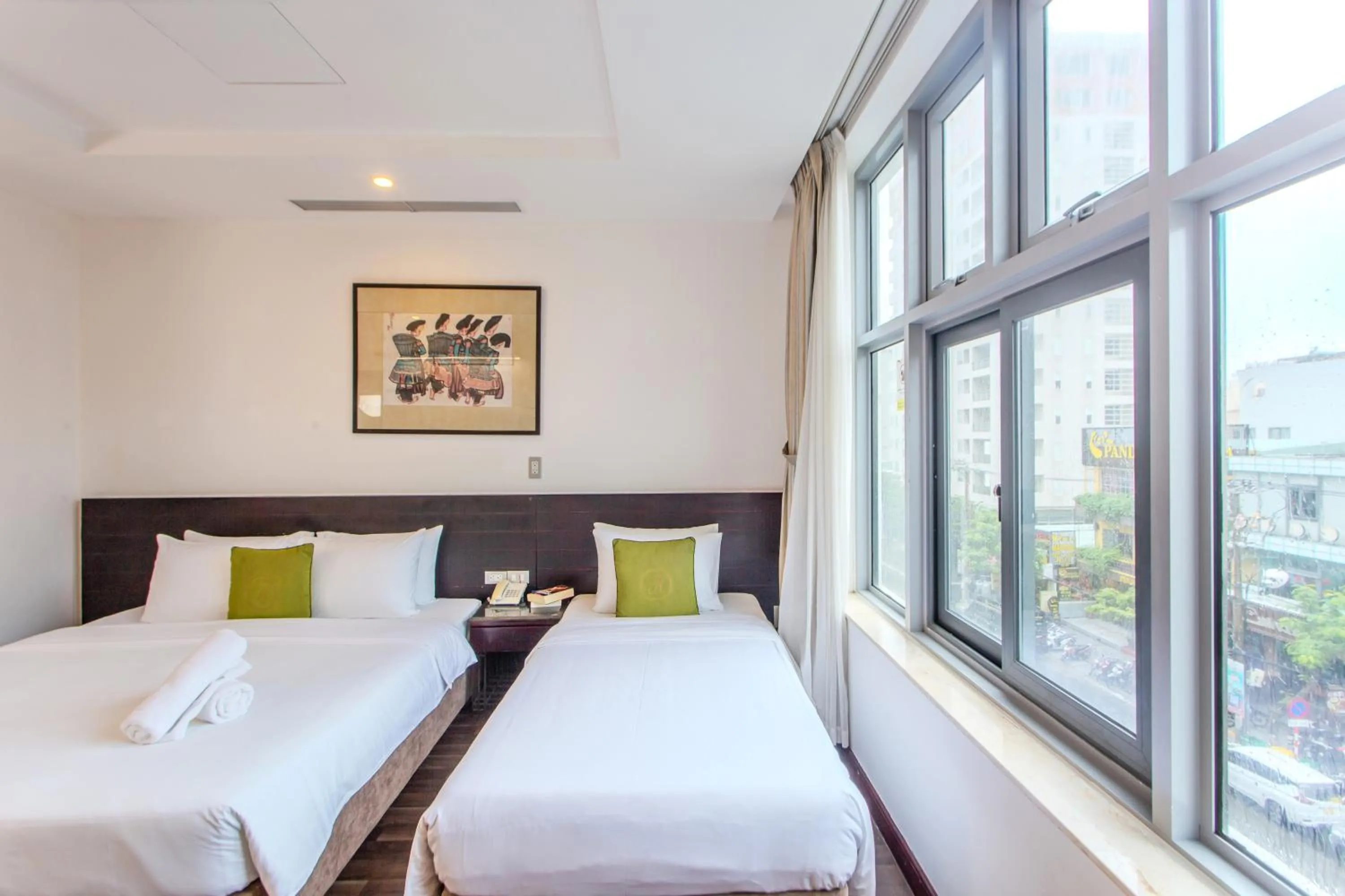 Bed in Richico Apartments And Hotel