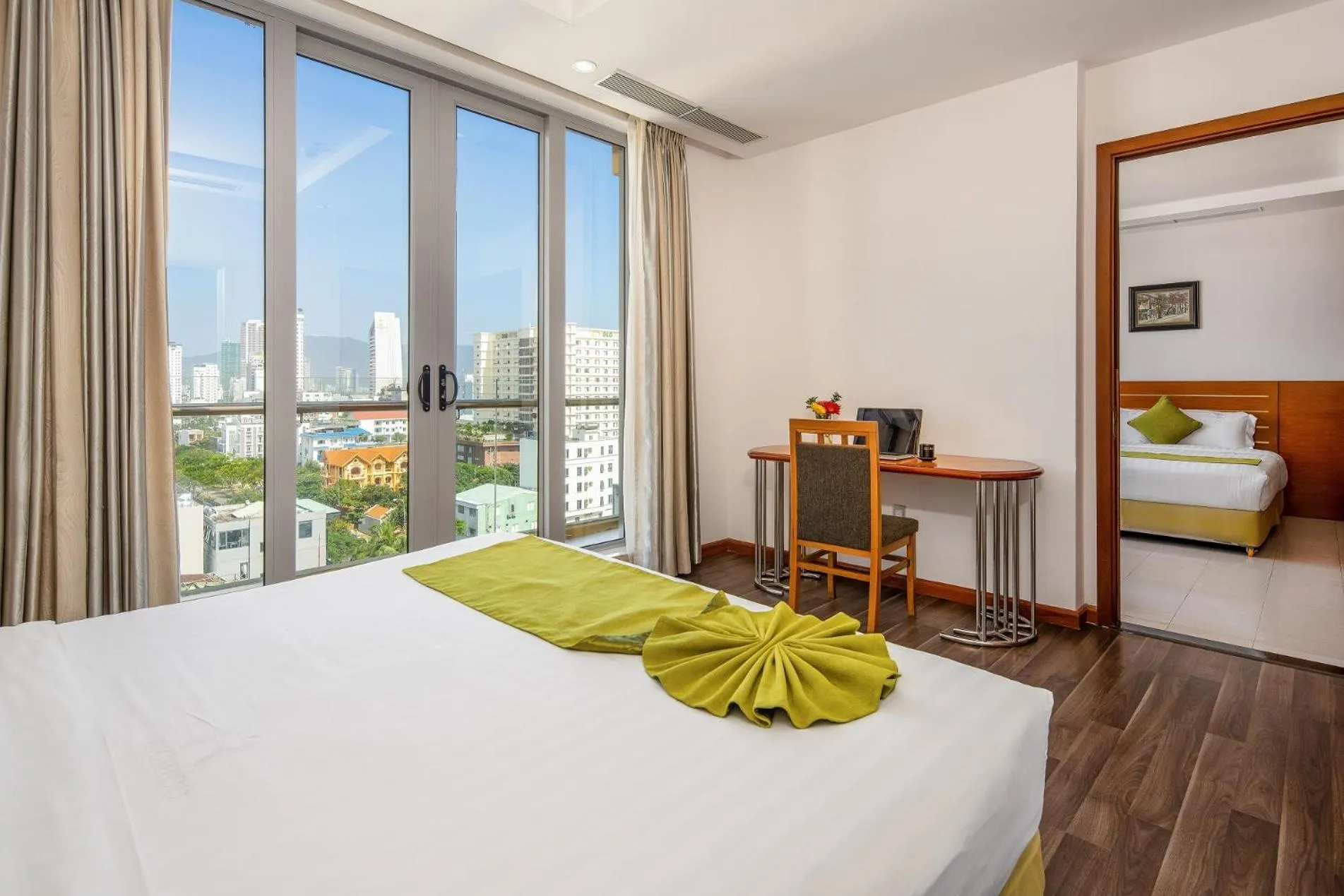 Bed in Richico Apartments And Hotel