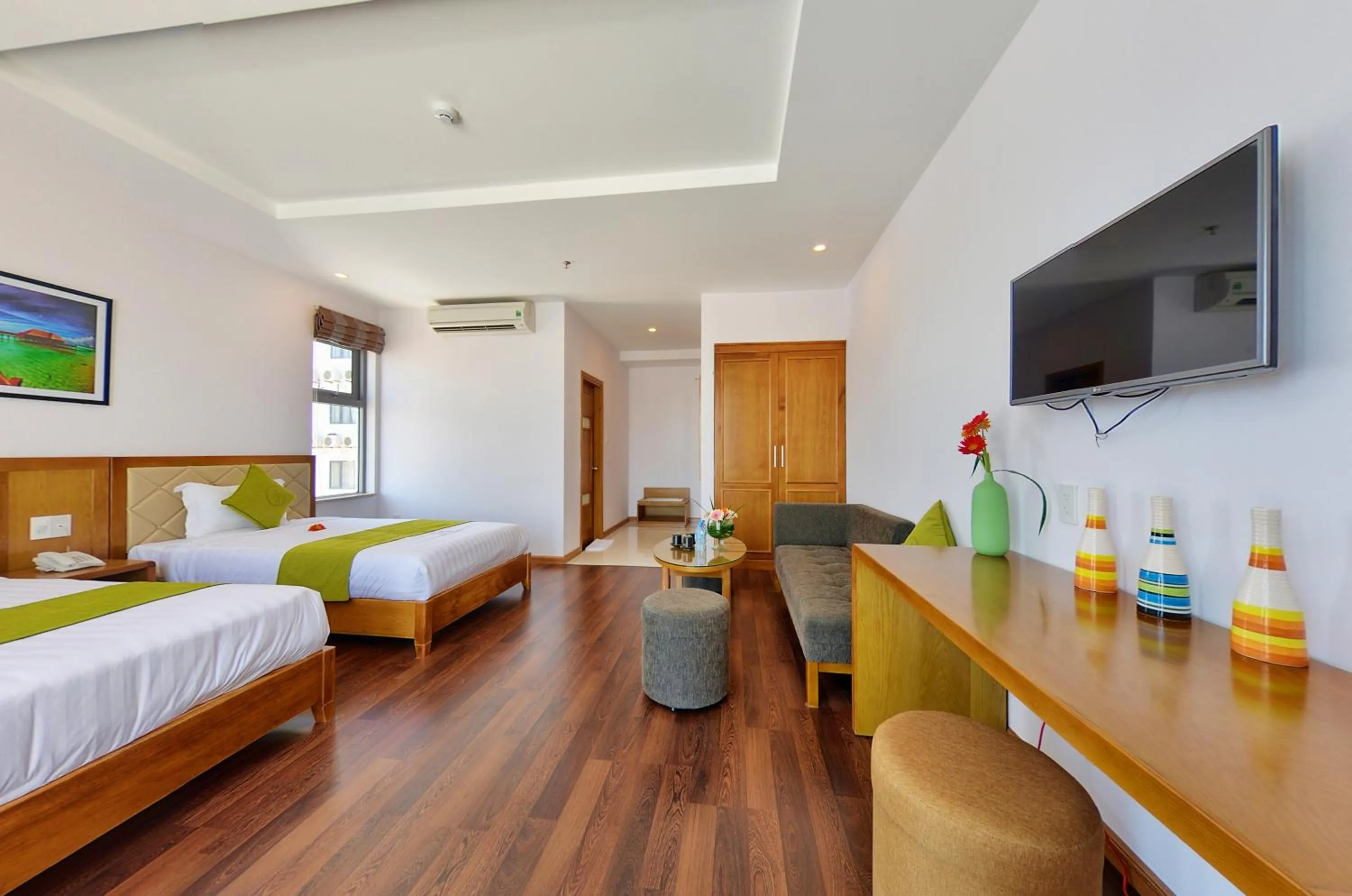 Bed in Richico Apartments And Hotel