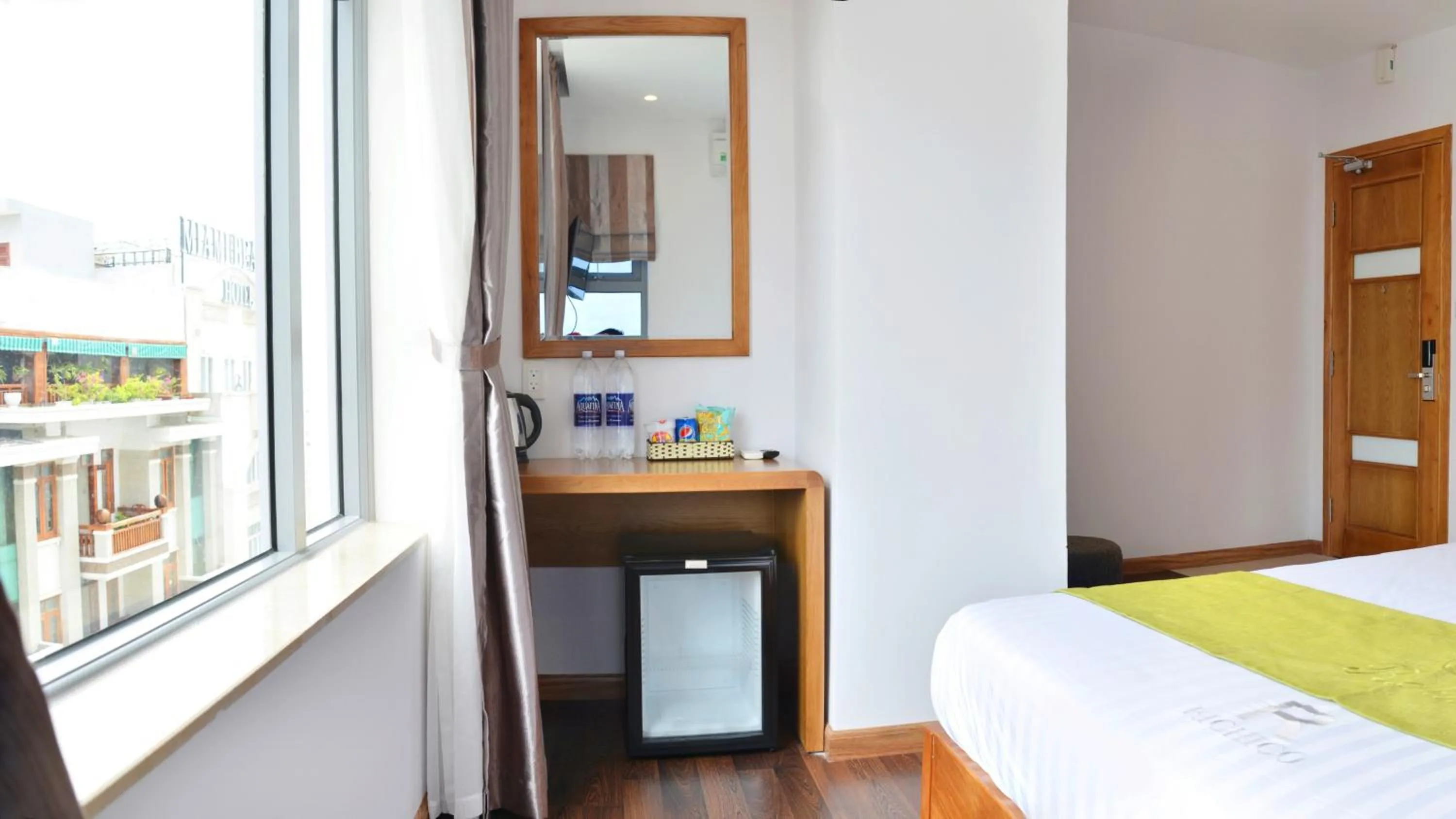 Bed in Richico Apartments And Hotel