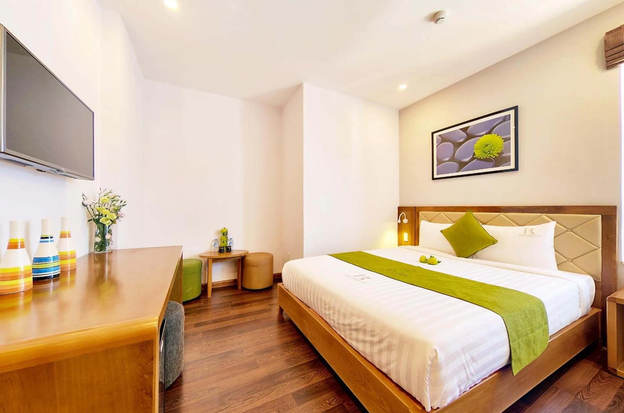Bed in Richico Apartments And Hotel
