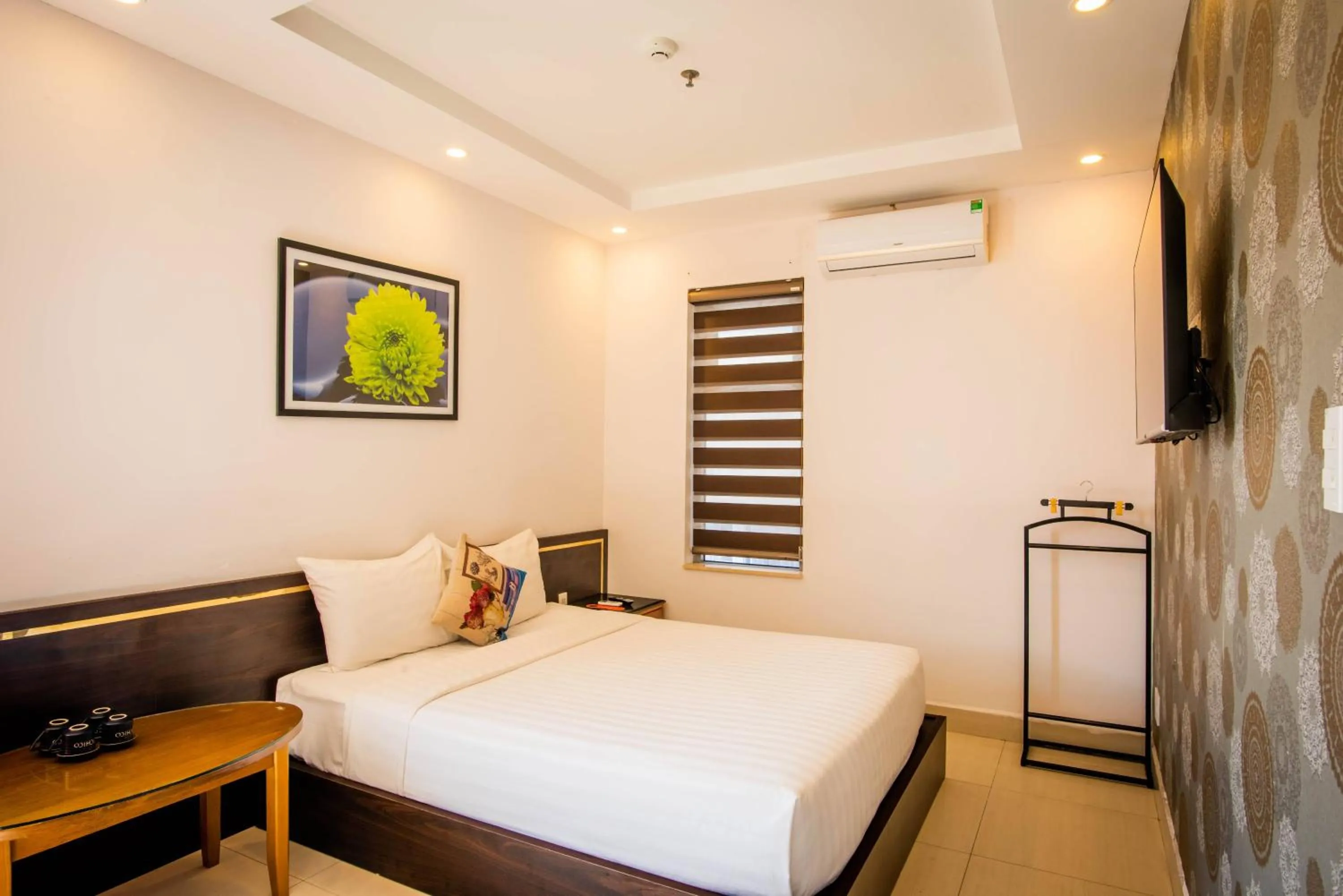 Bed in Richico Apartments And Hotel