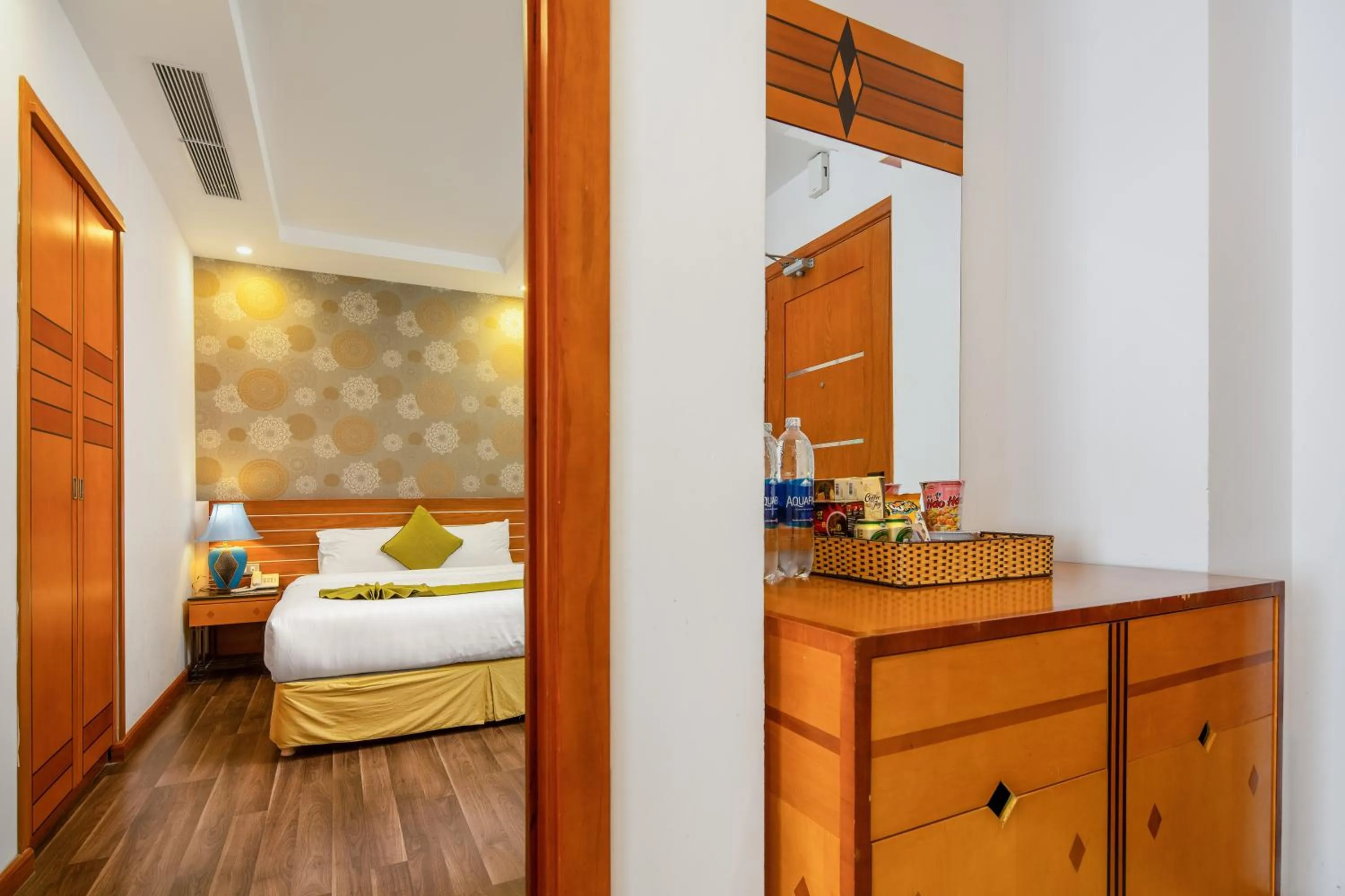 Bed in Richico Apartments And Hotel