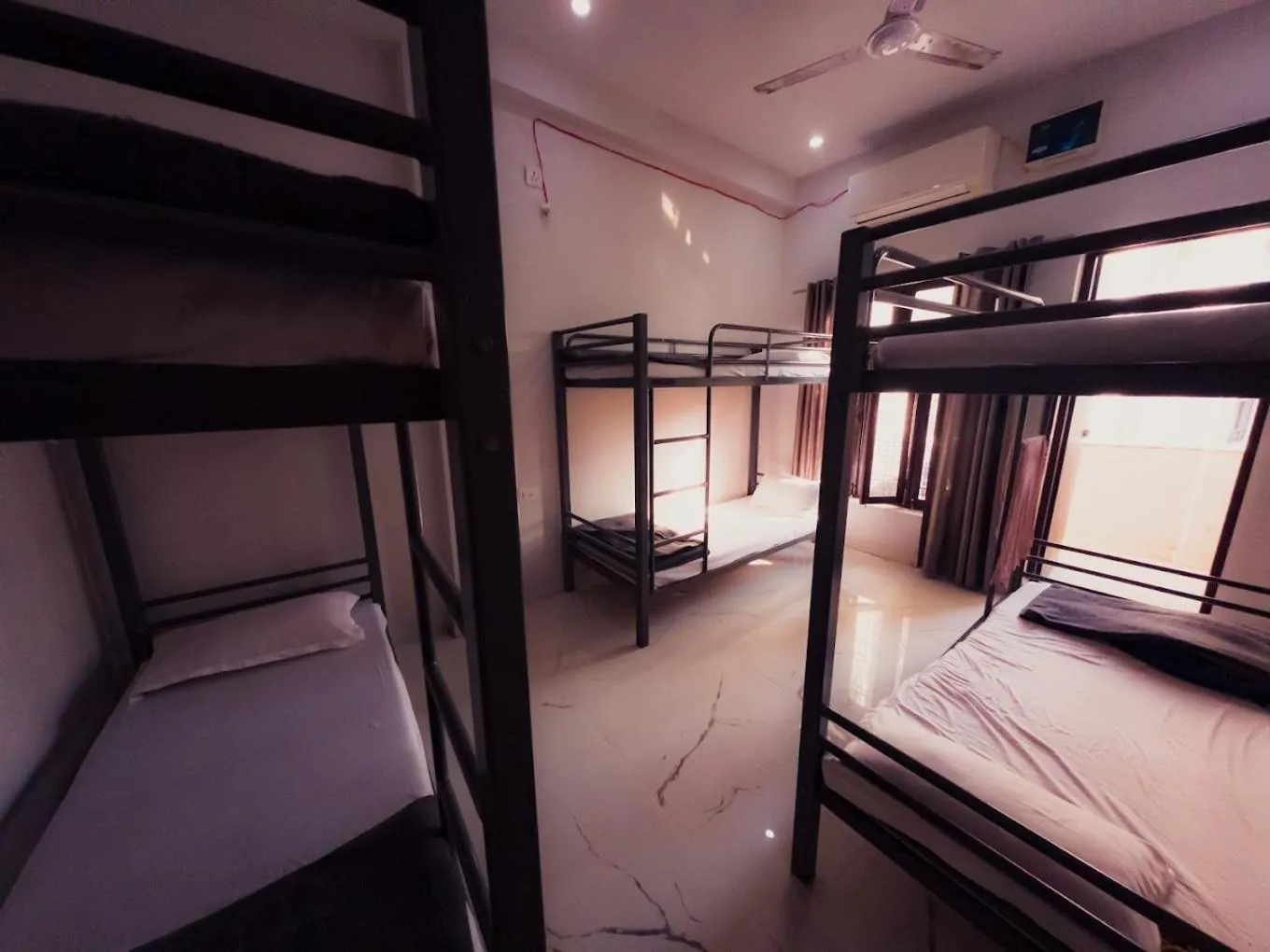 Photo of the whole room, Bed in OLT Hostel Rishikesh