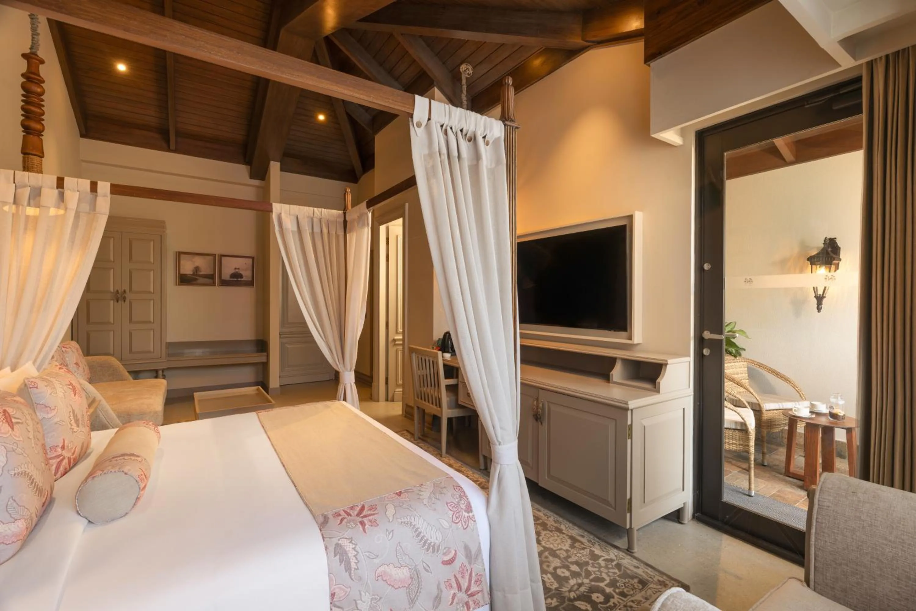 Communal lounge/ TV room, Bed in The Evren, Vagator - SLH-A Small Luxury Hotel