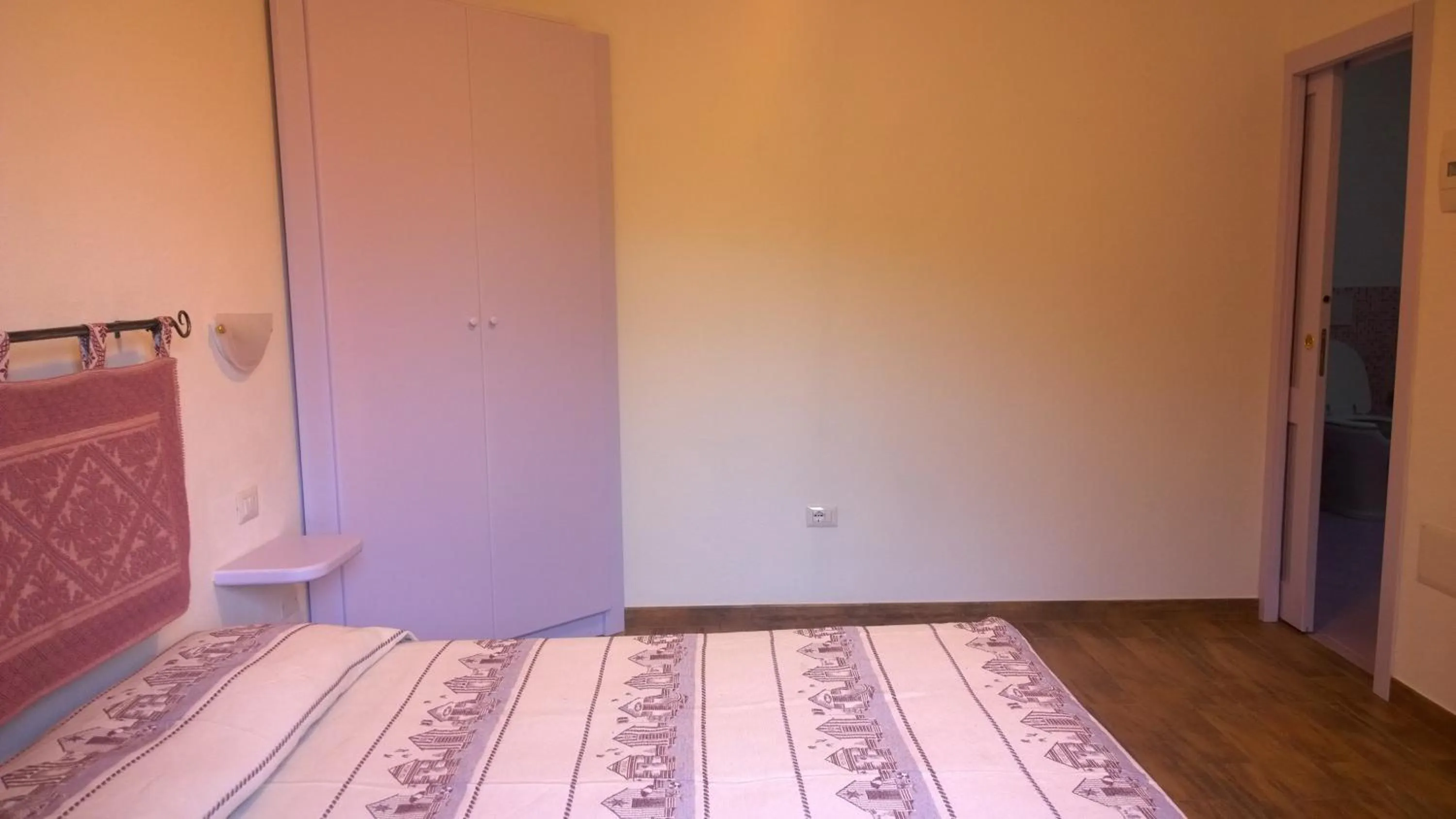 Bed in Le Maschere B&B