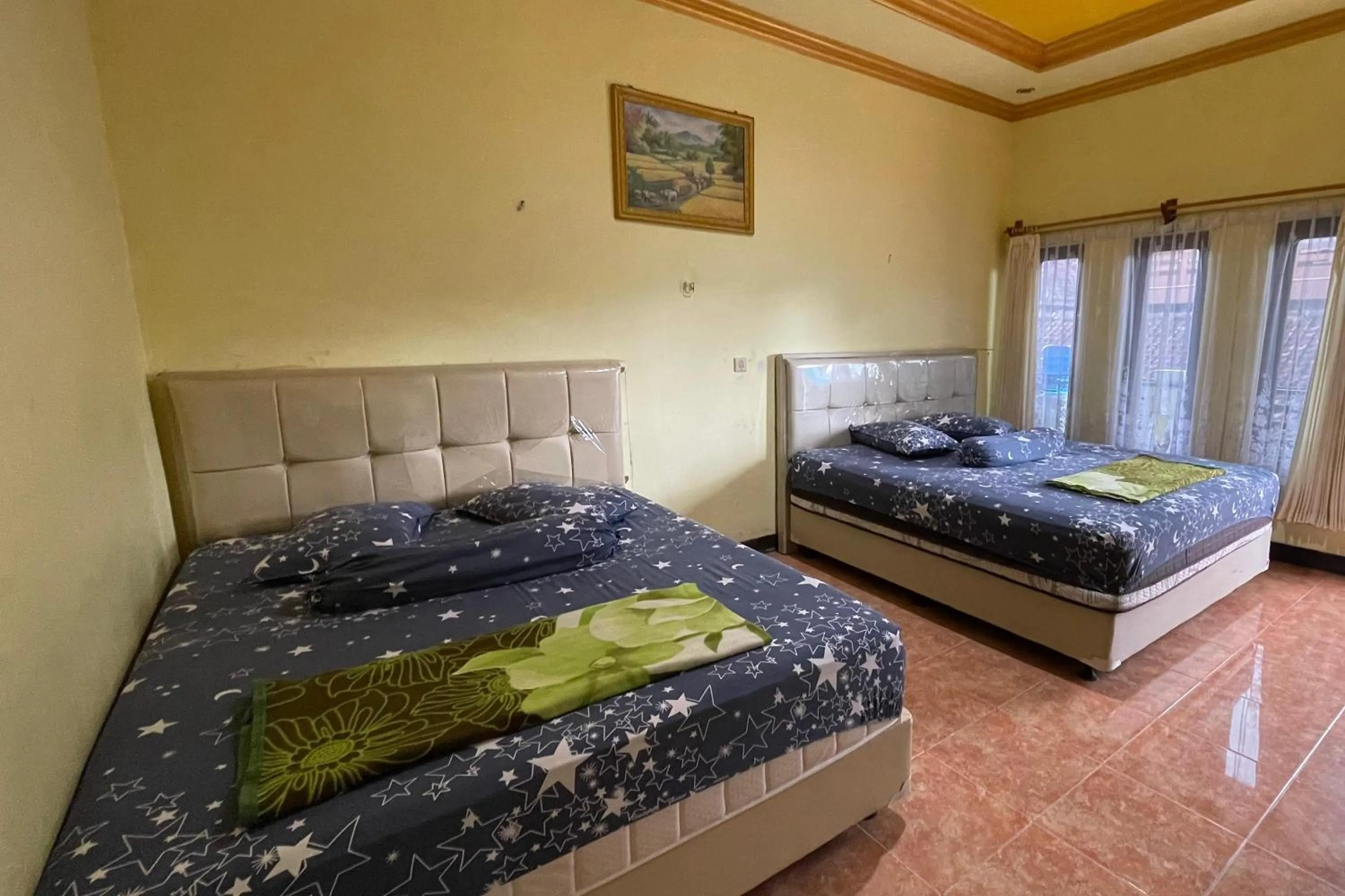 Bedroom, Bed in Hotel Malinda Pangandaran