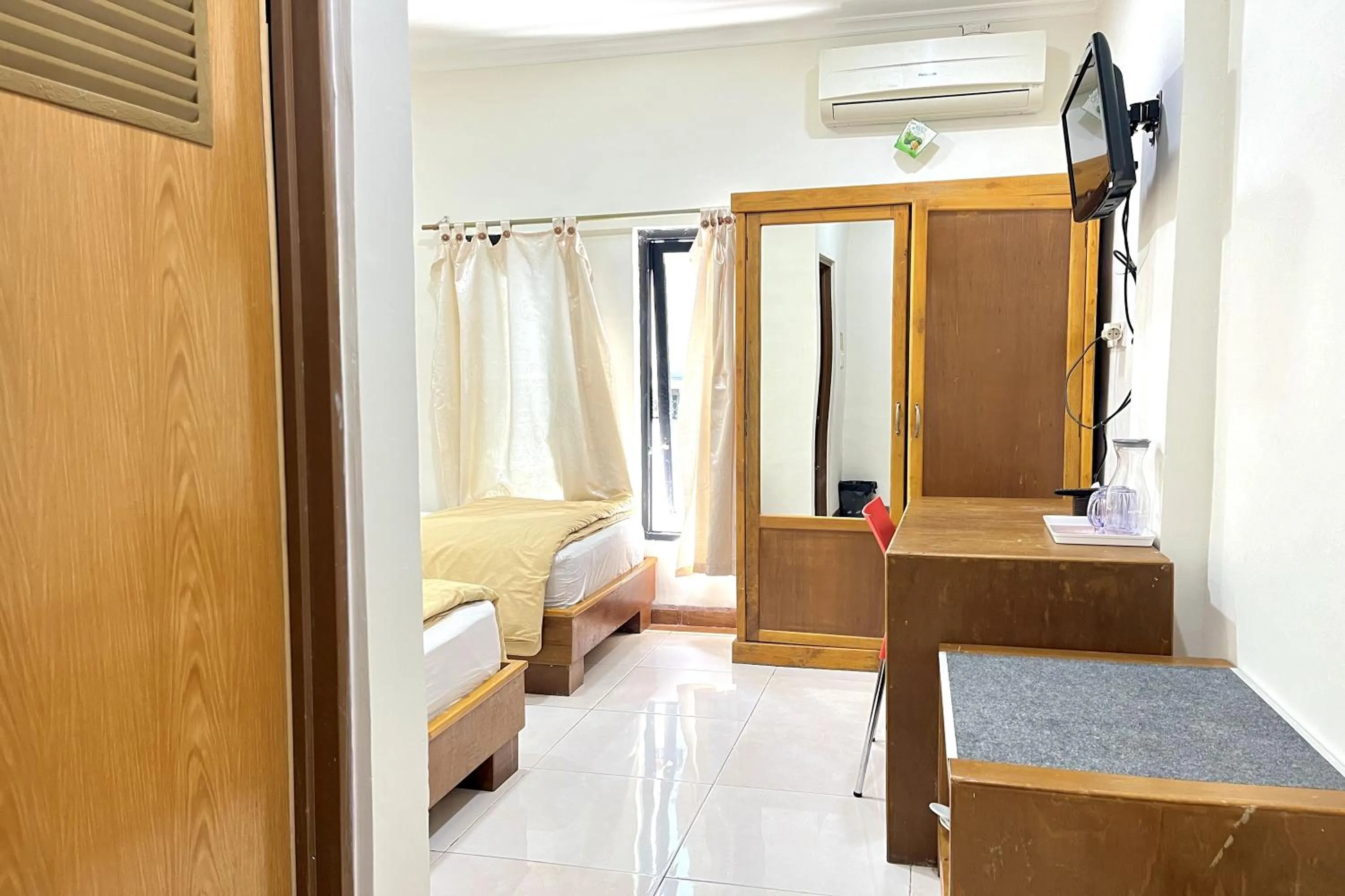 Bed in Maison Hotel Bukittinggi