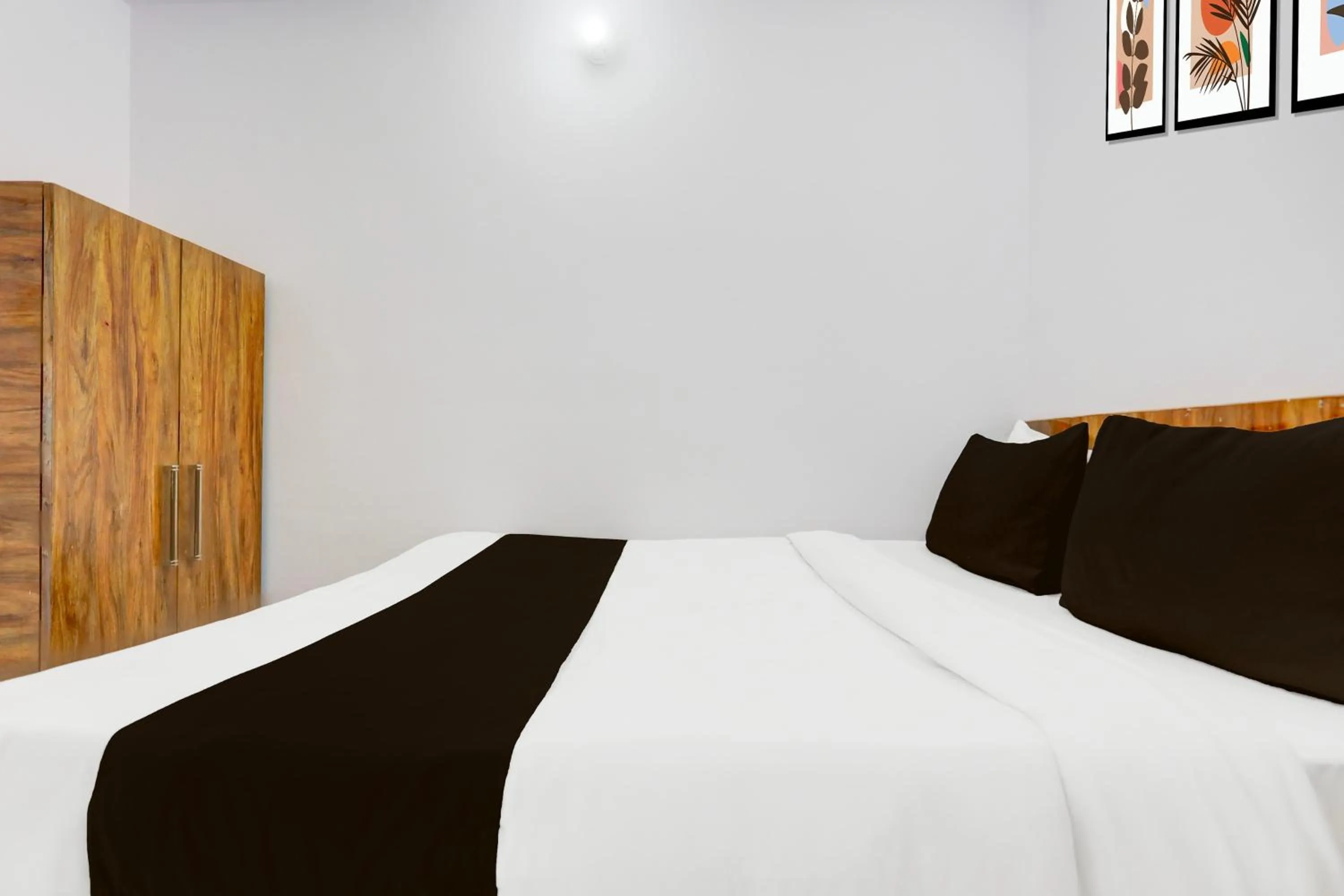 Bedroom, Bed in Super Hotel O Rajeev Nagar Formerly Happy Journey