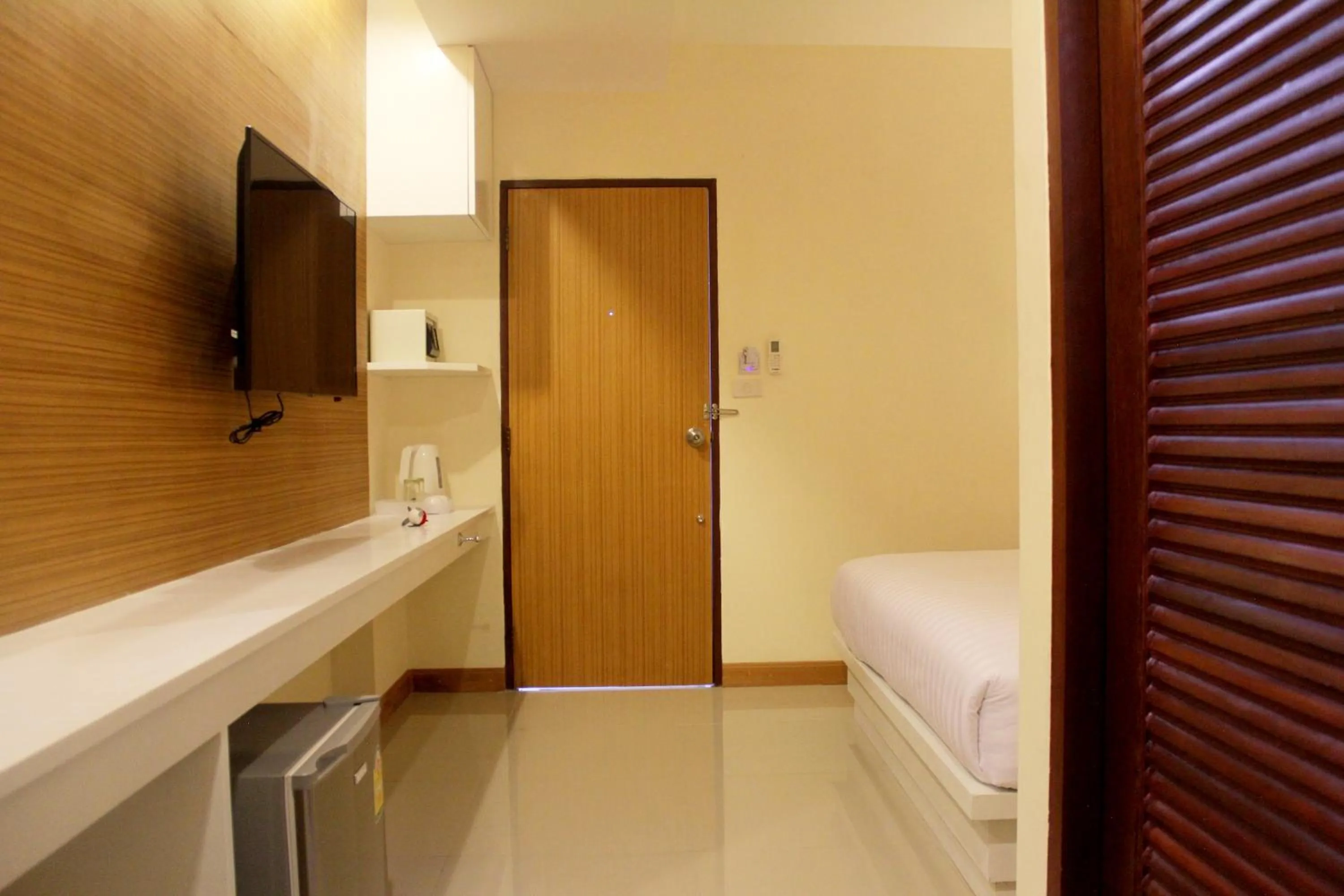 Photo of the whole room, Bed in The Little Nest Phuket