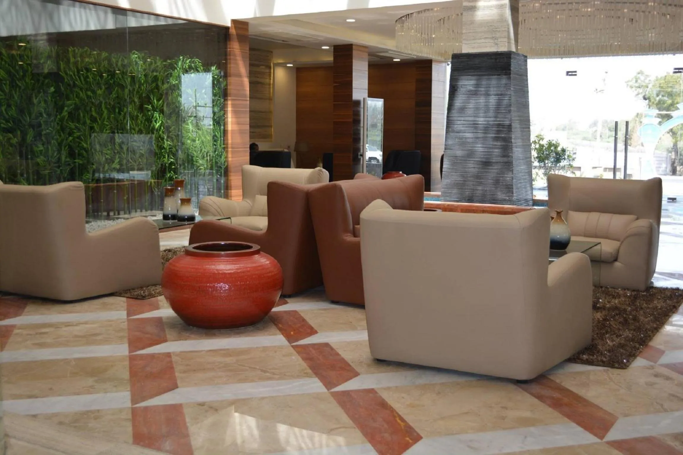 Communal lounge/ TV room in The Fern Residency Mundra