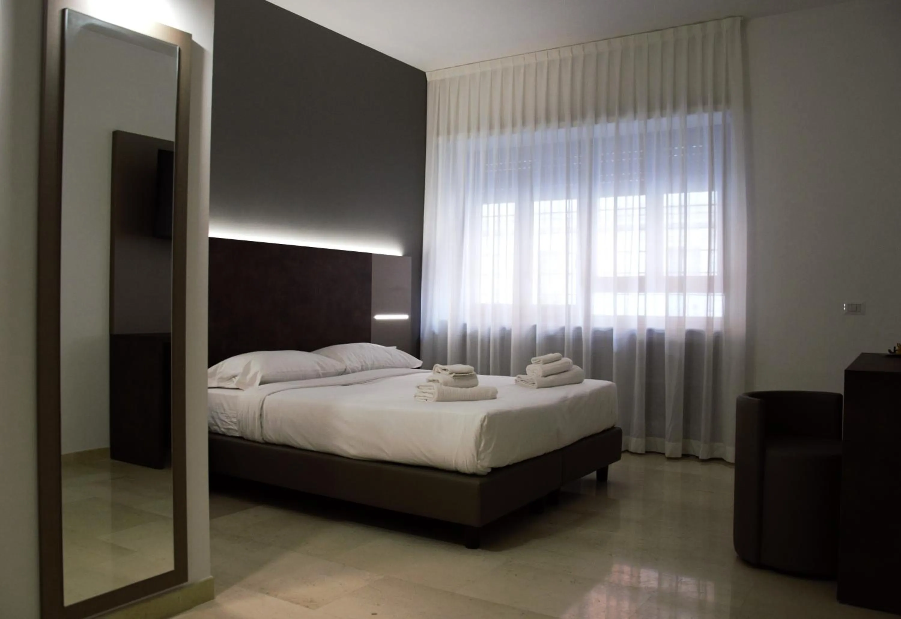 Bed in Domus Dea Roma by Trinità