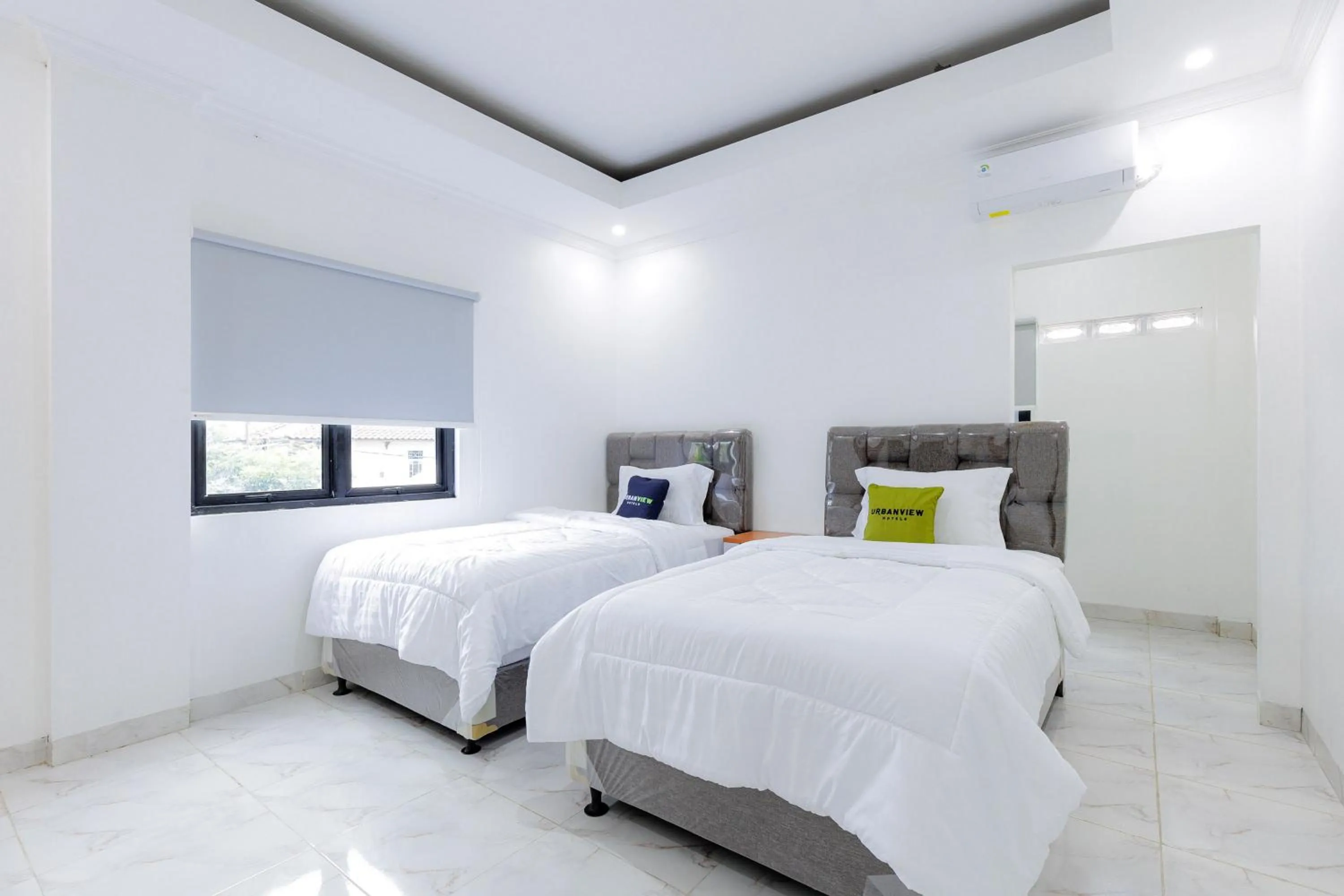 Bedroom, Bed in Urbanview Hotel Amira Syariah Bogor