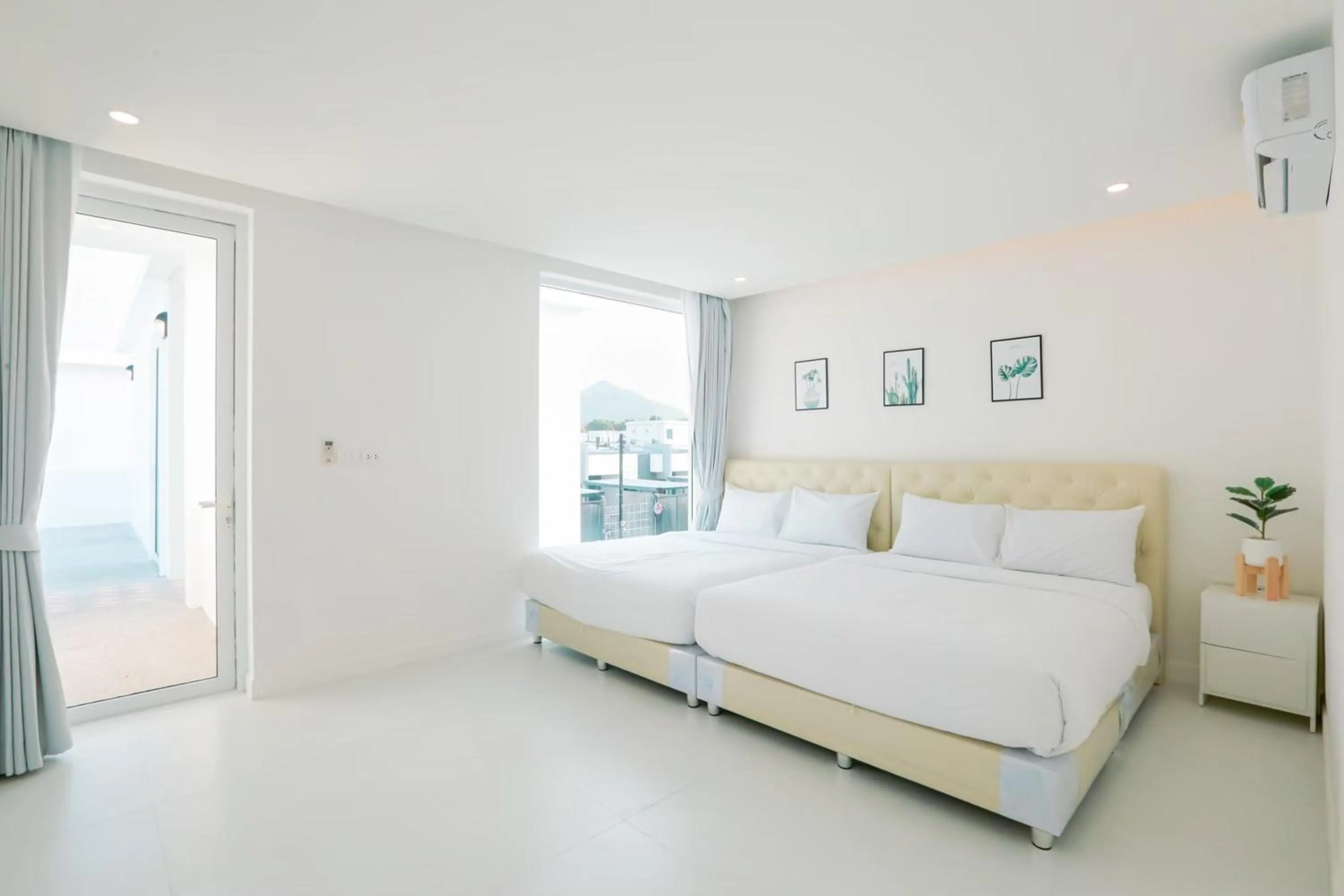 Bed in The Modern Pool Villa Hua Hin