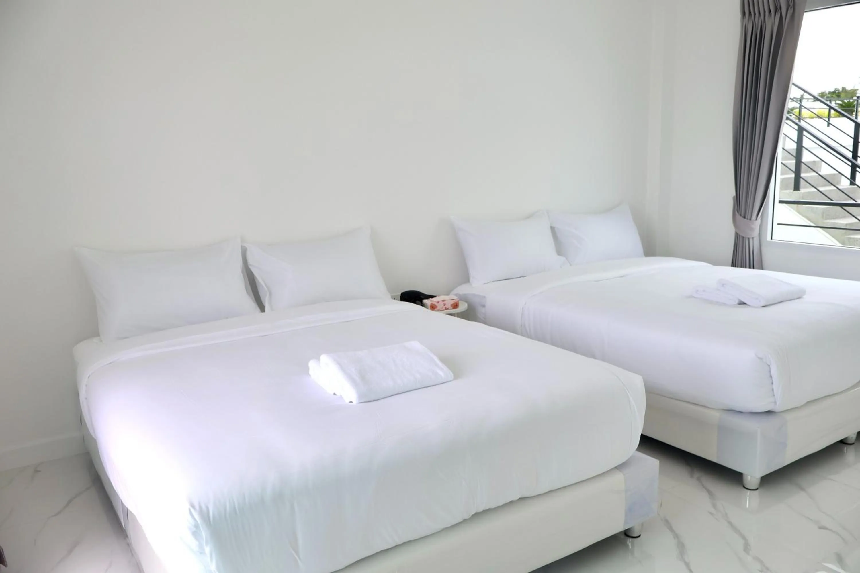 Bed in The Modern Pool Villa Hua Hin