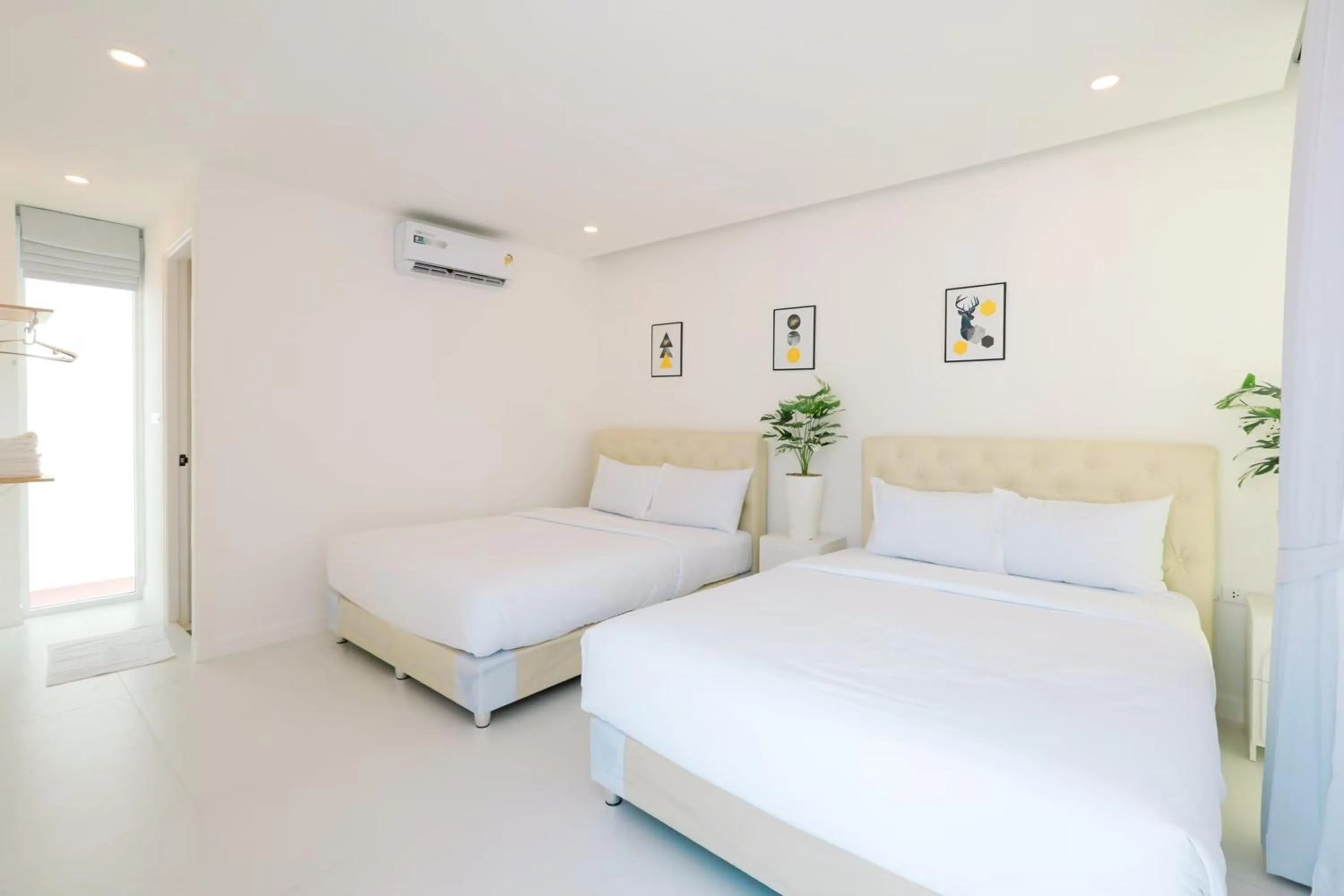 Bed in The Modern Pool Villa Hua Hin