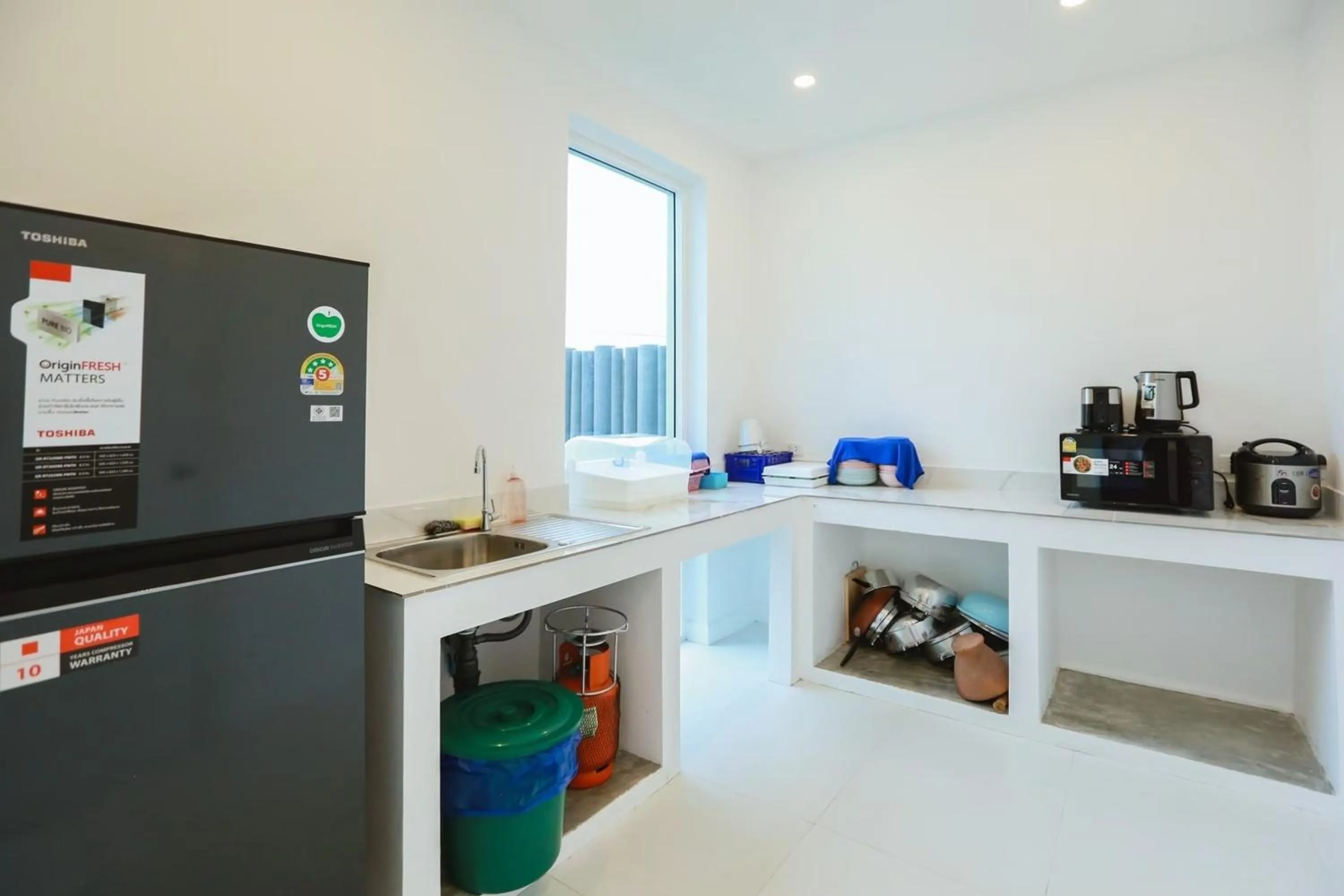 Kitchen or kitchenette in The Modern Pool Villa Hua Hin