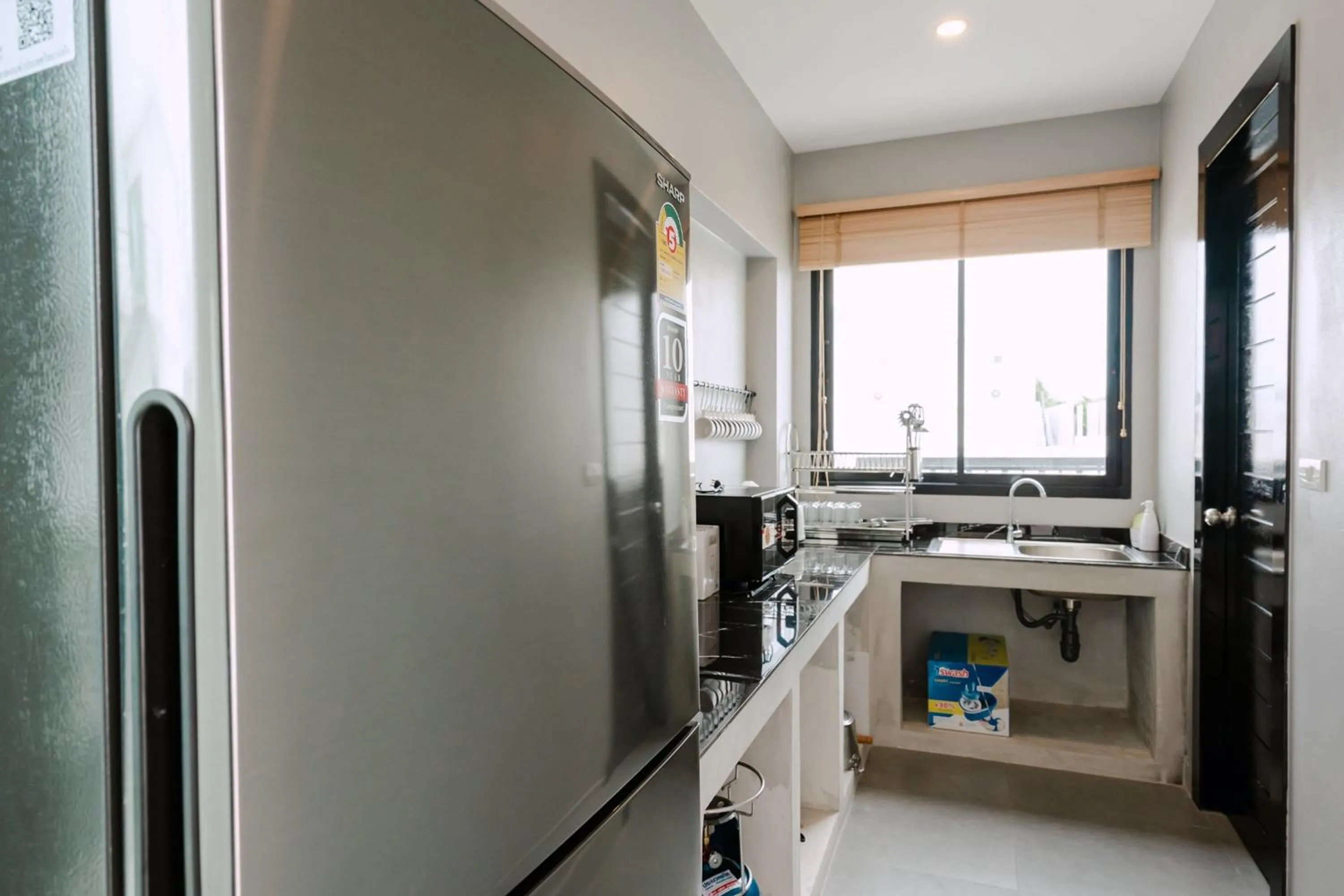 Kitchen or kitchenette in The Modern Pool Villa Hua Hin