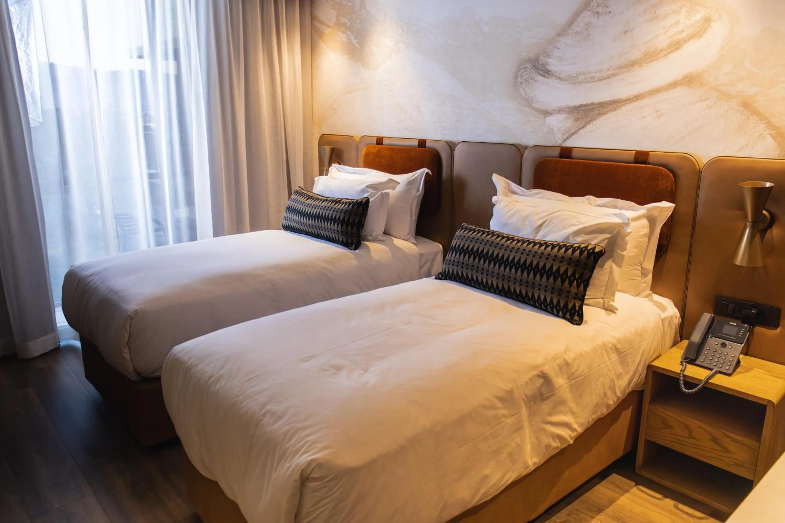 Bed in Mpilo Boutique Hotel