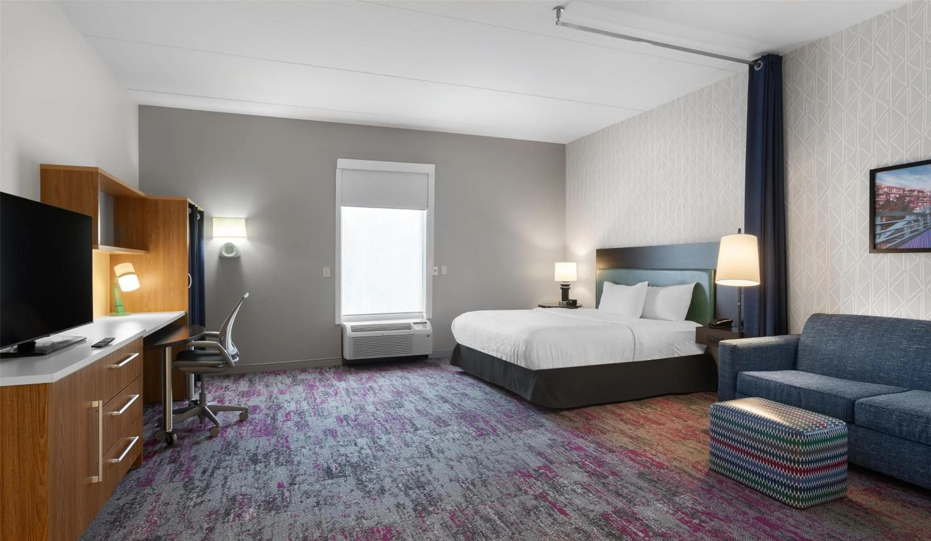 Living room, Bed in Home2 Suites by Hilton Greenville Airport