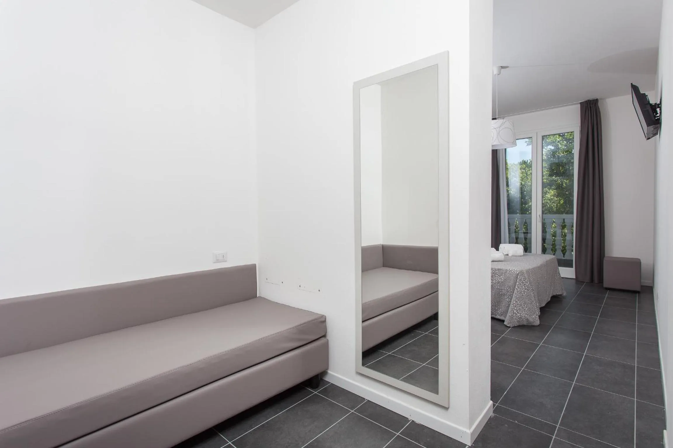 Living room, Bed in Hotel Star