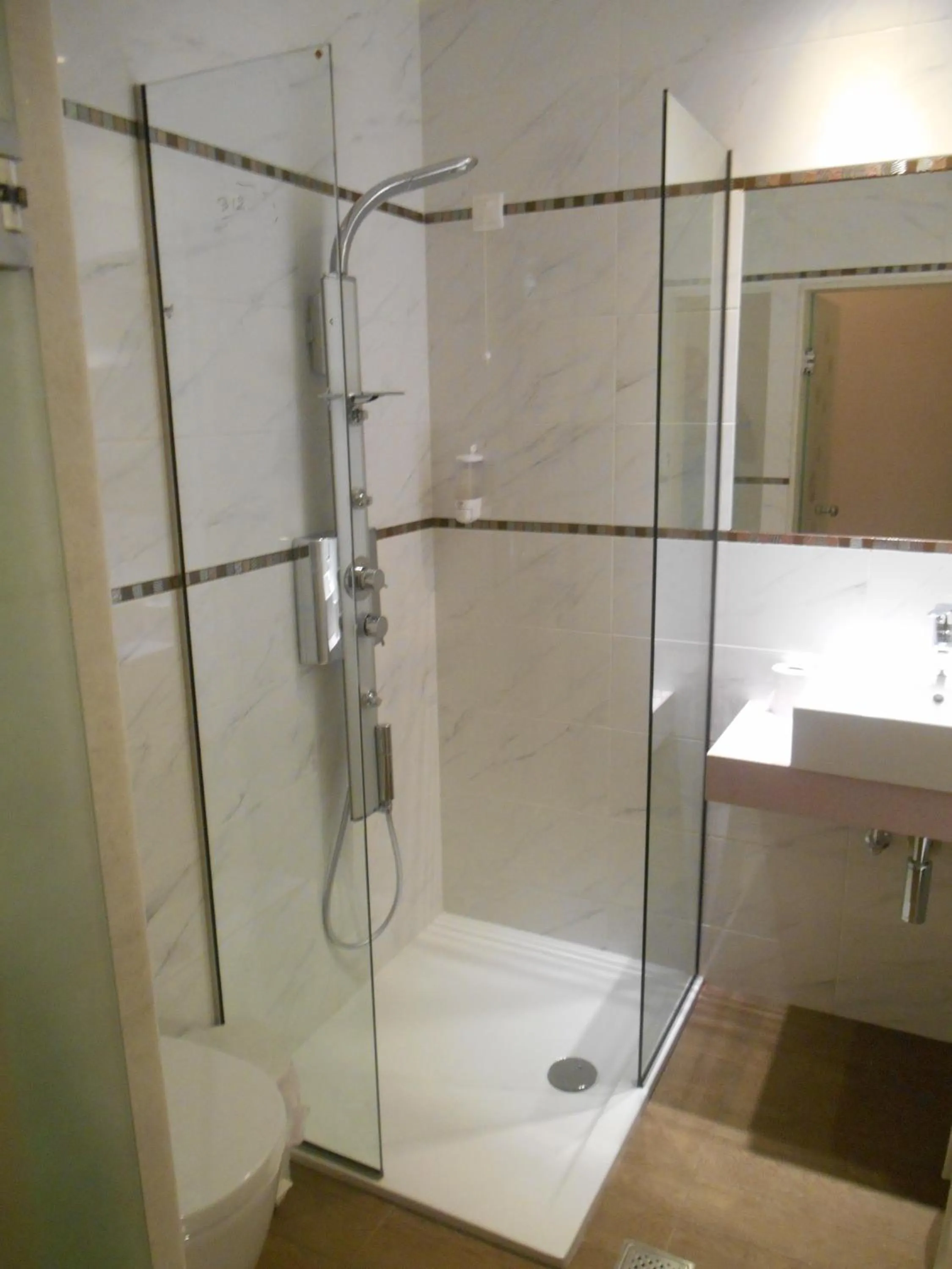 Bathroom in Frini Hotel