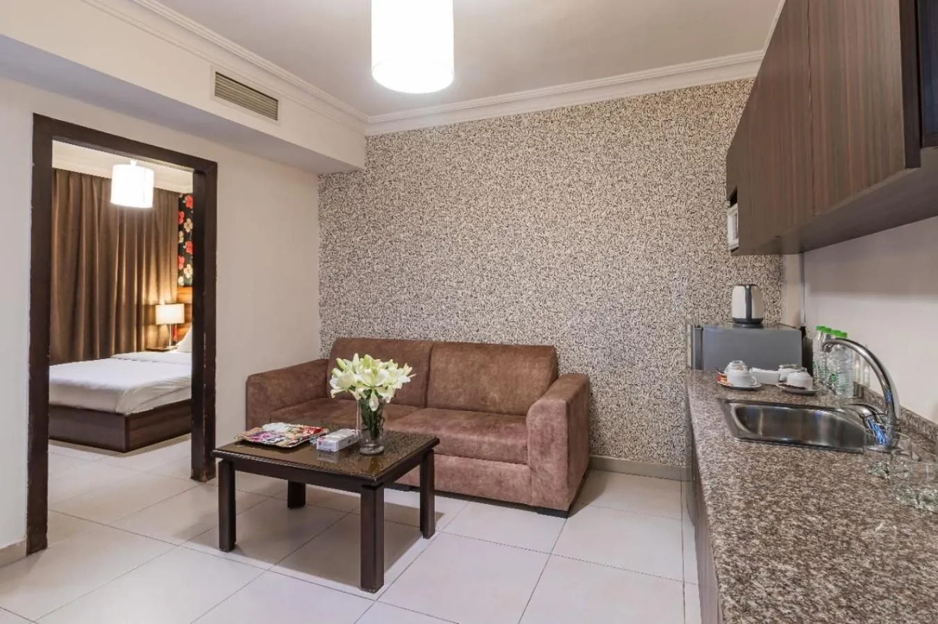 Living room, Bed in Lancaster Hotel Apartments-Gardens