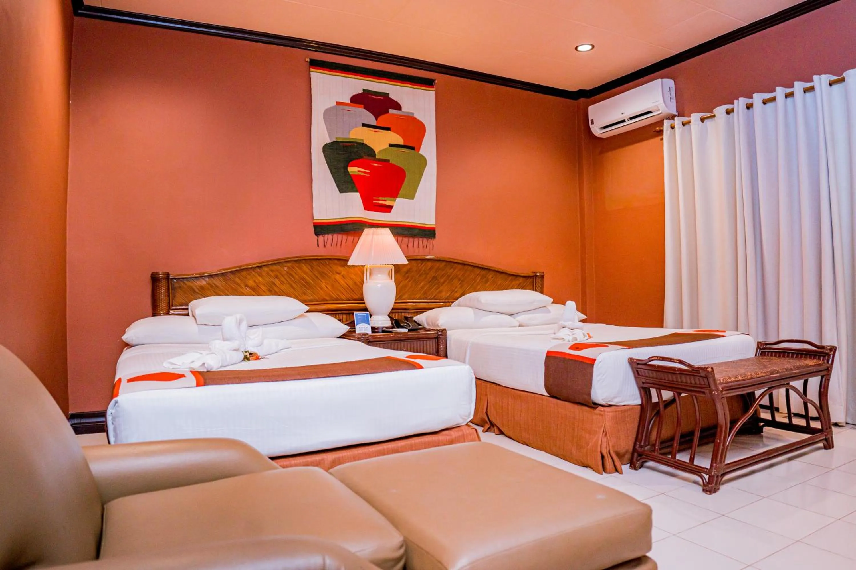 Photo of the whole room, Bed in Paras Beach Resort - Camiguin