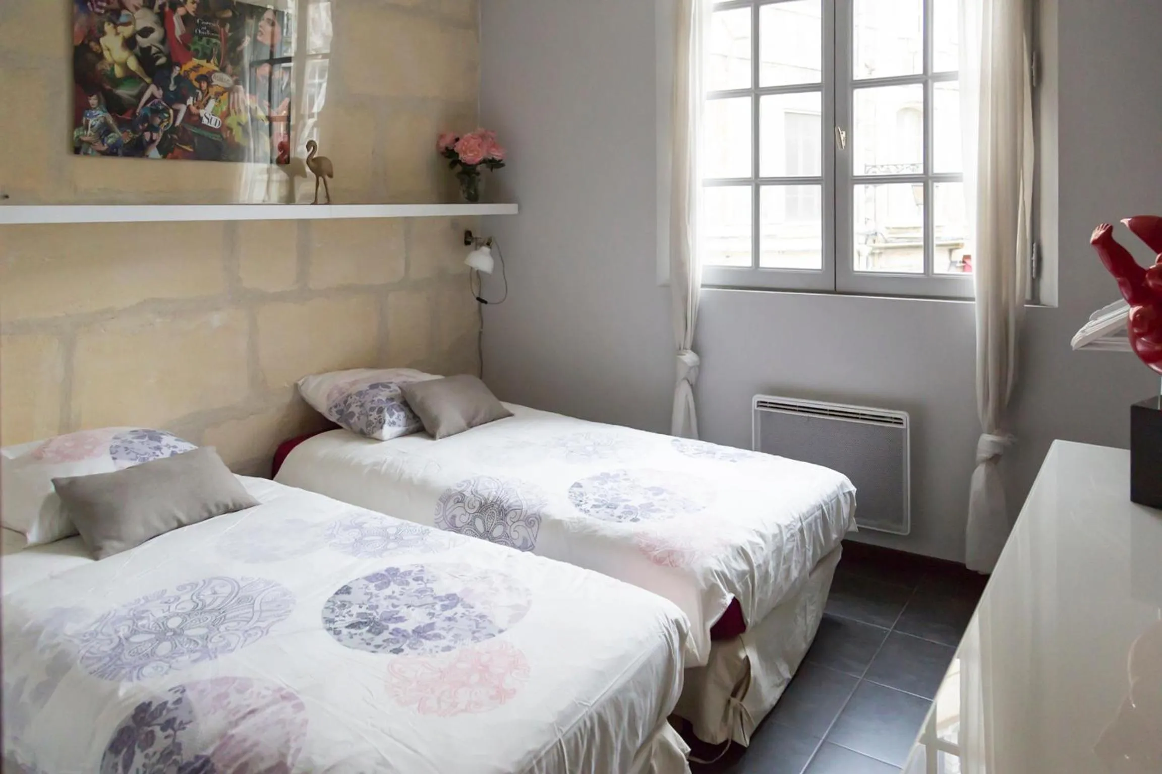 Bed in Appartements "La Chambre D'Ami"