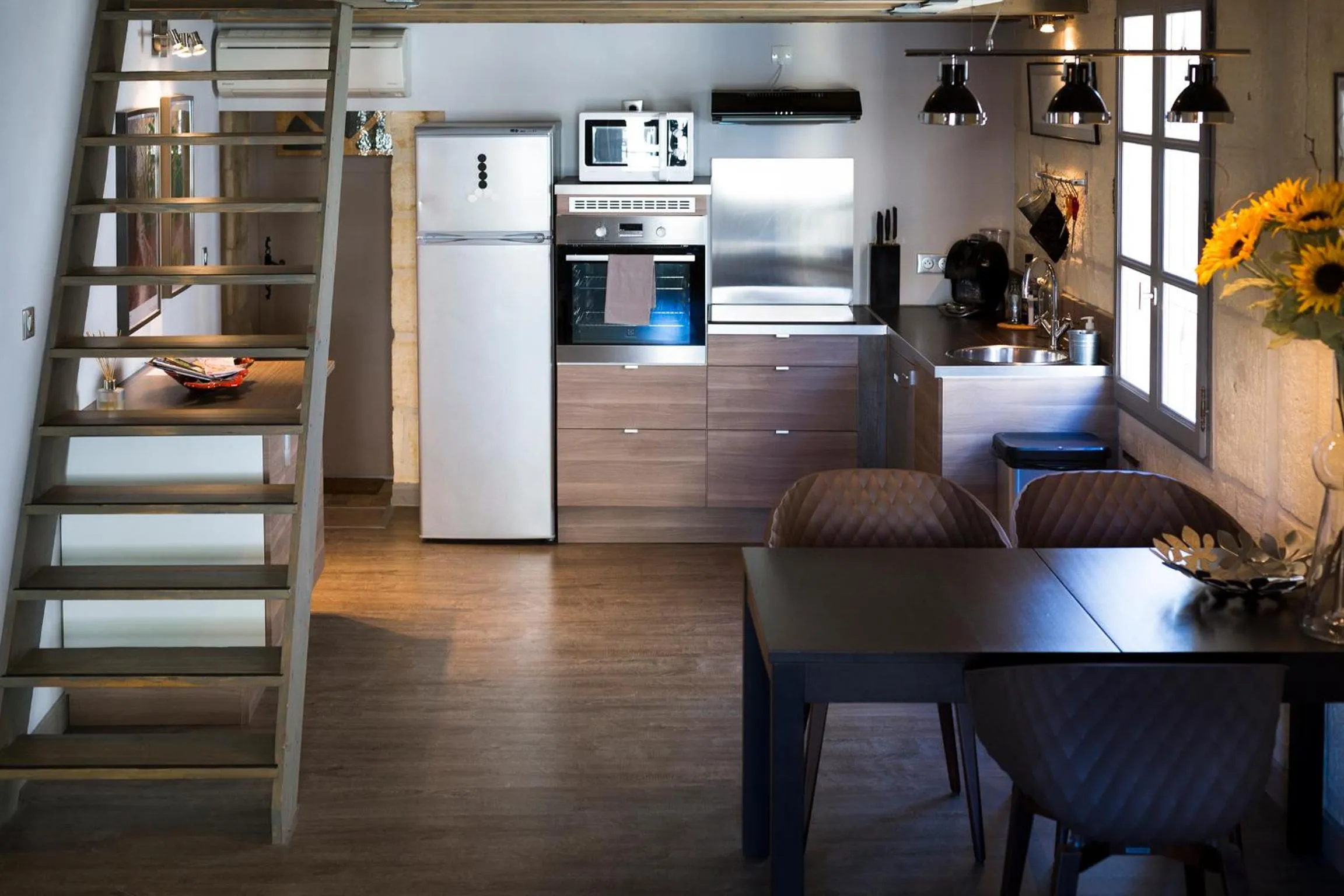 Communal kitchen in Appartements "La Chambre D'Ami"