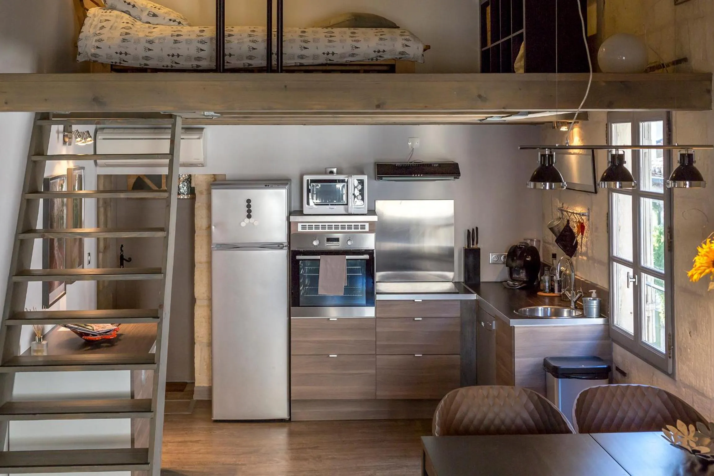 Communal kitchen in Appartements "La Chambre D'Ami"