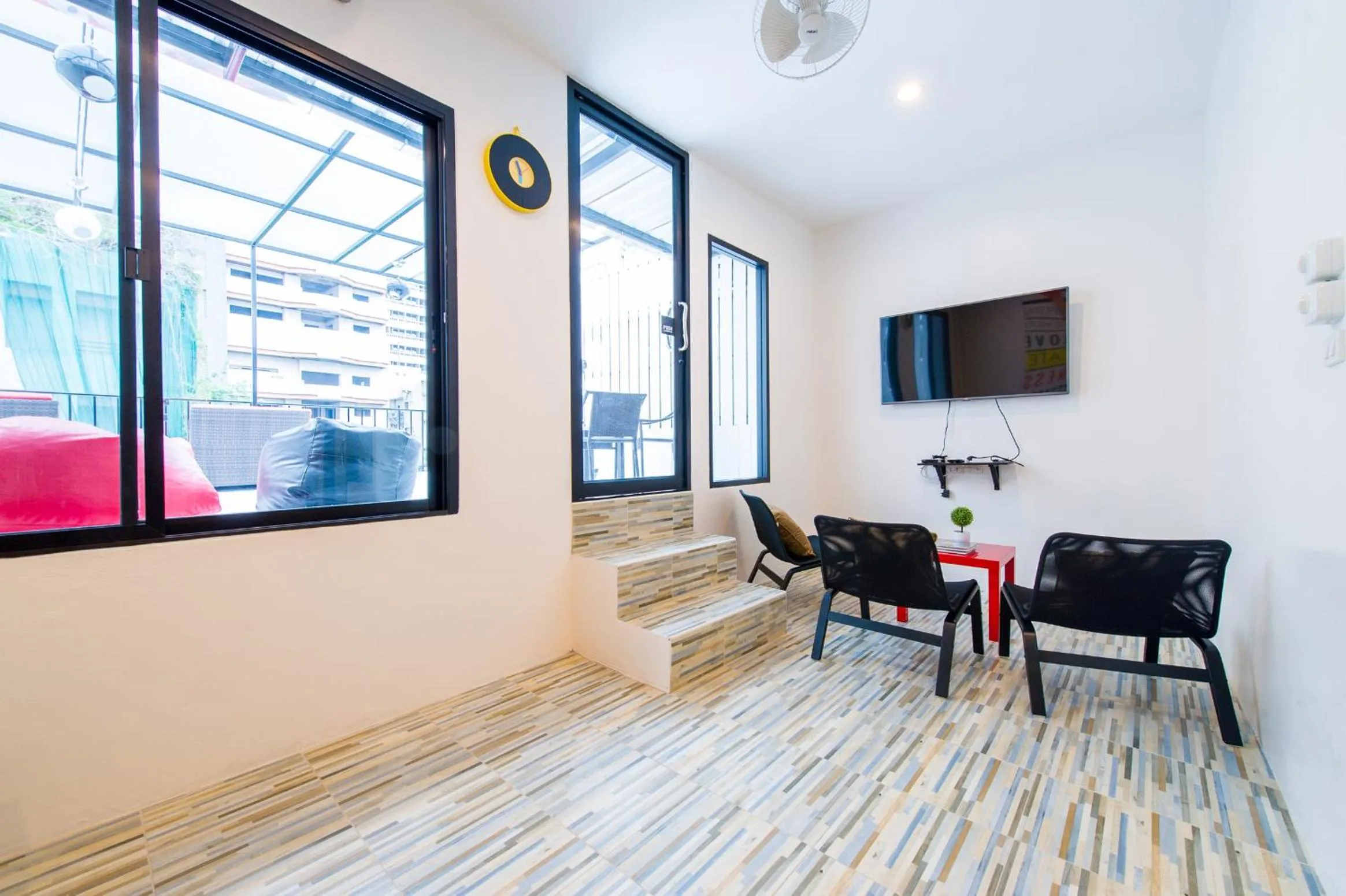 Seating area in Matchbox Bangkok Hostel