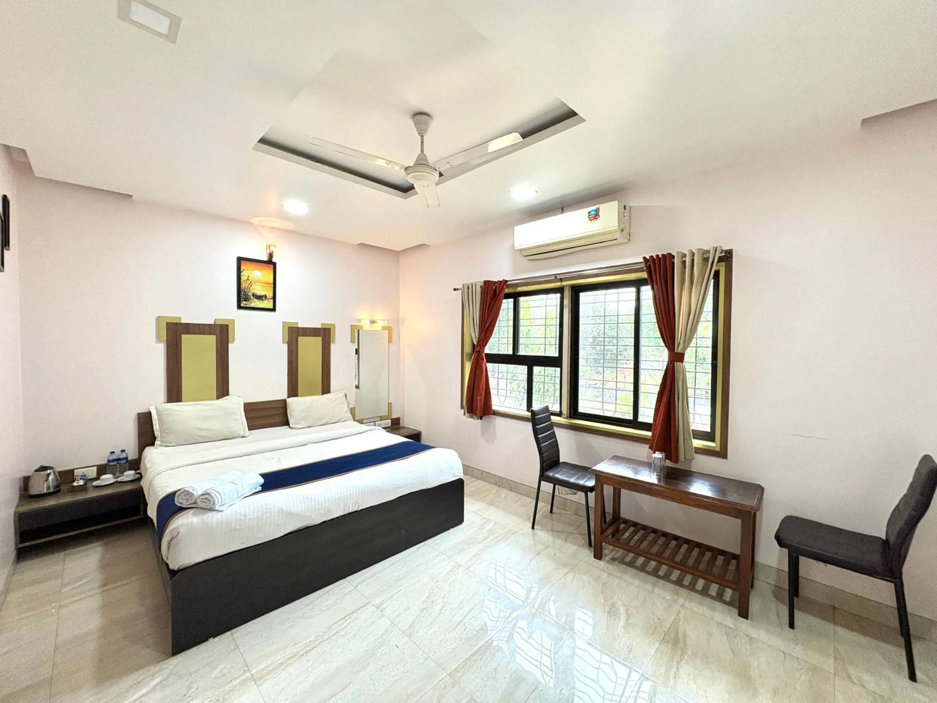 Bed in Hotel Laxmi Residency
