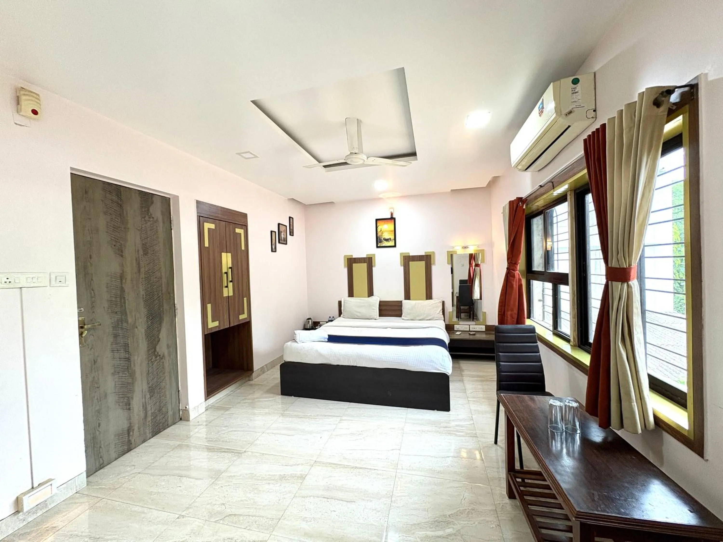 Photo of the whole room, Bed in Hotel Laxmi Residency