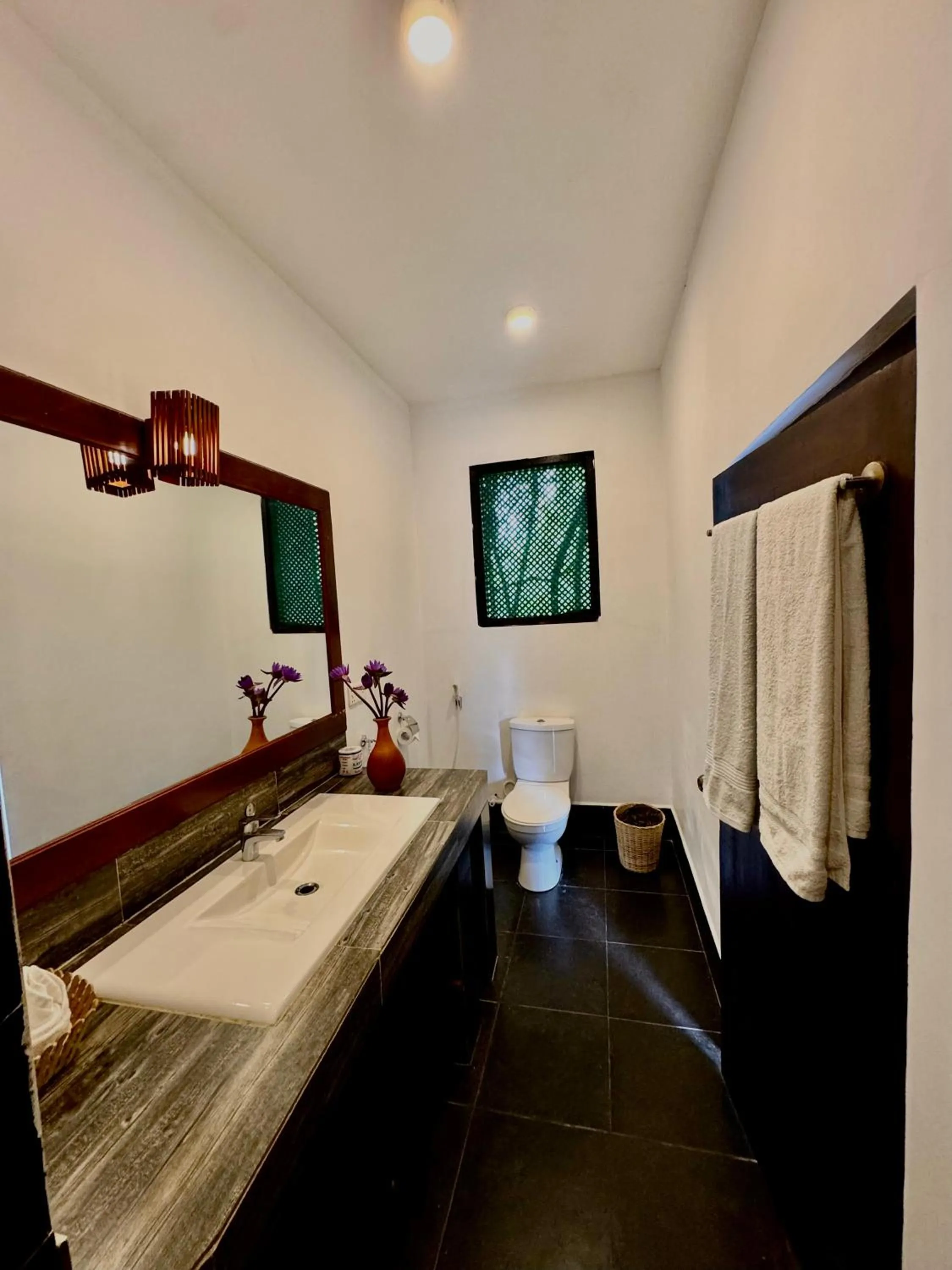 Bathroom in Sundaras Family Suites