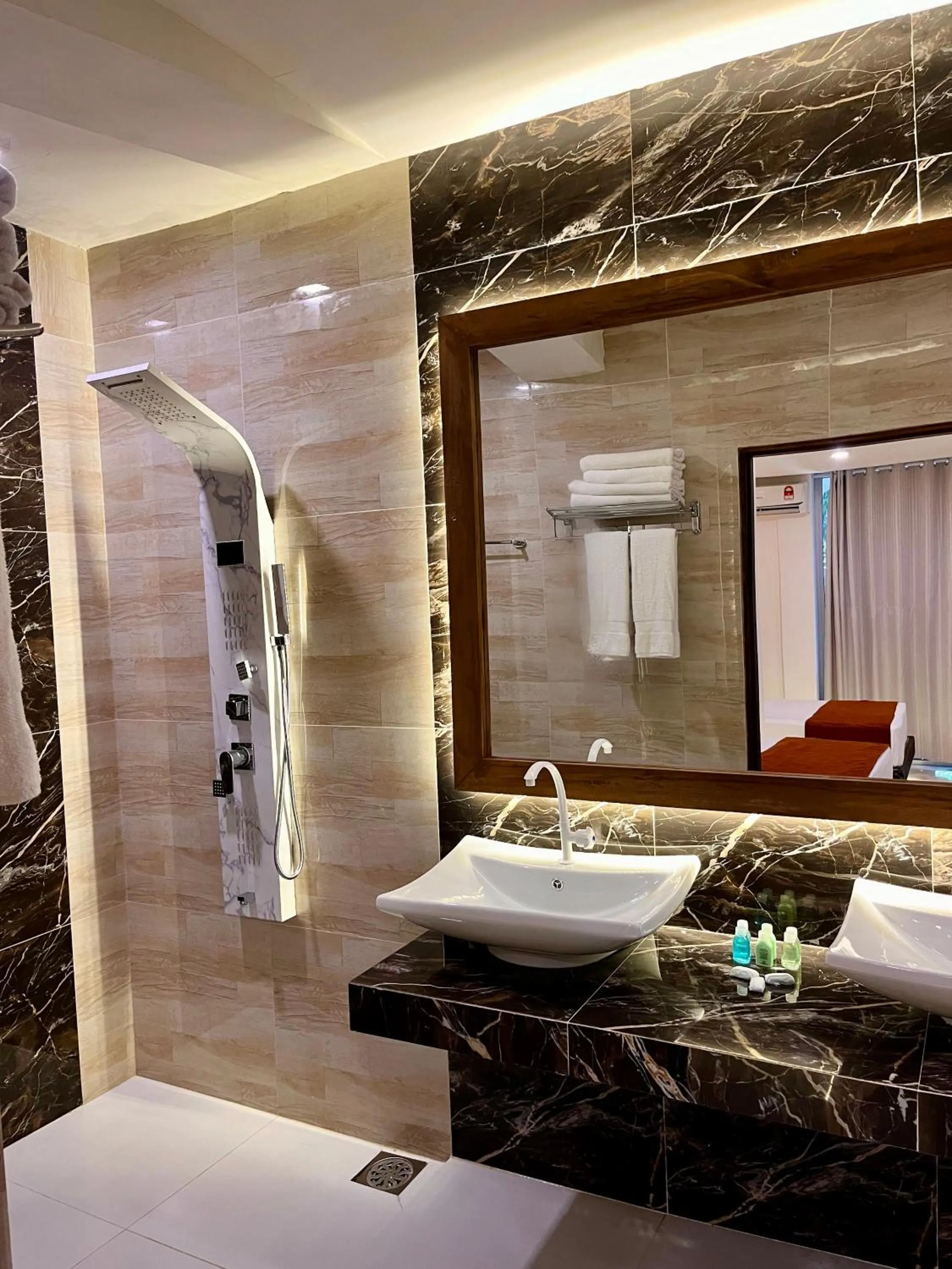 Bathroom in Sundaras Family Suites