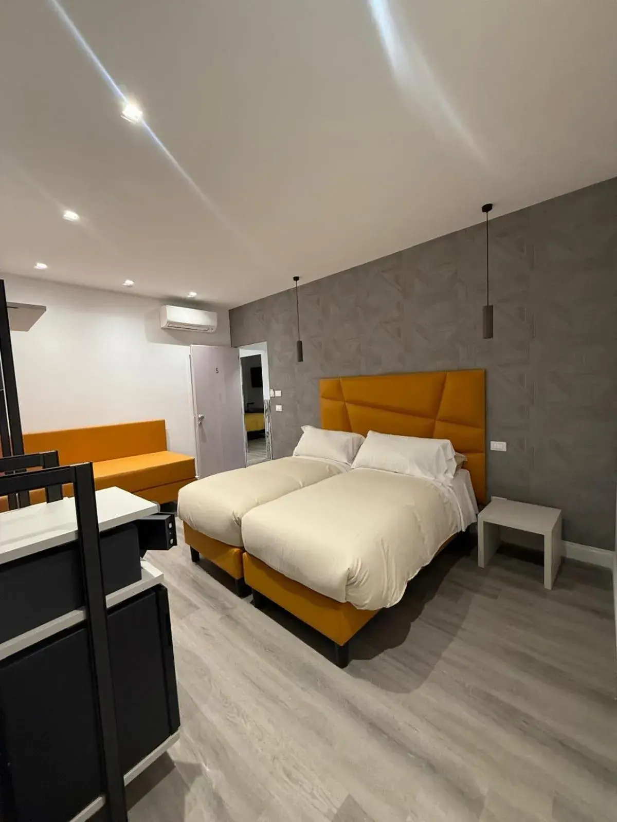 Classic Triple Room in FoffoSuite Classic Triple Room in FoffoSuite