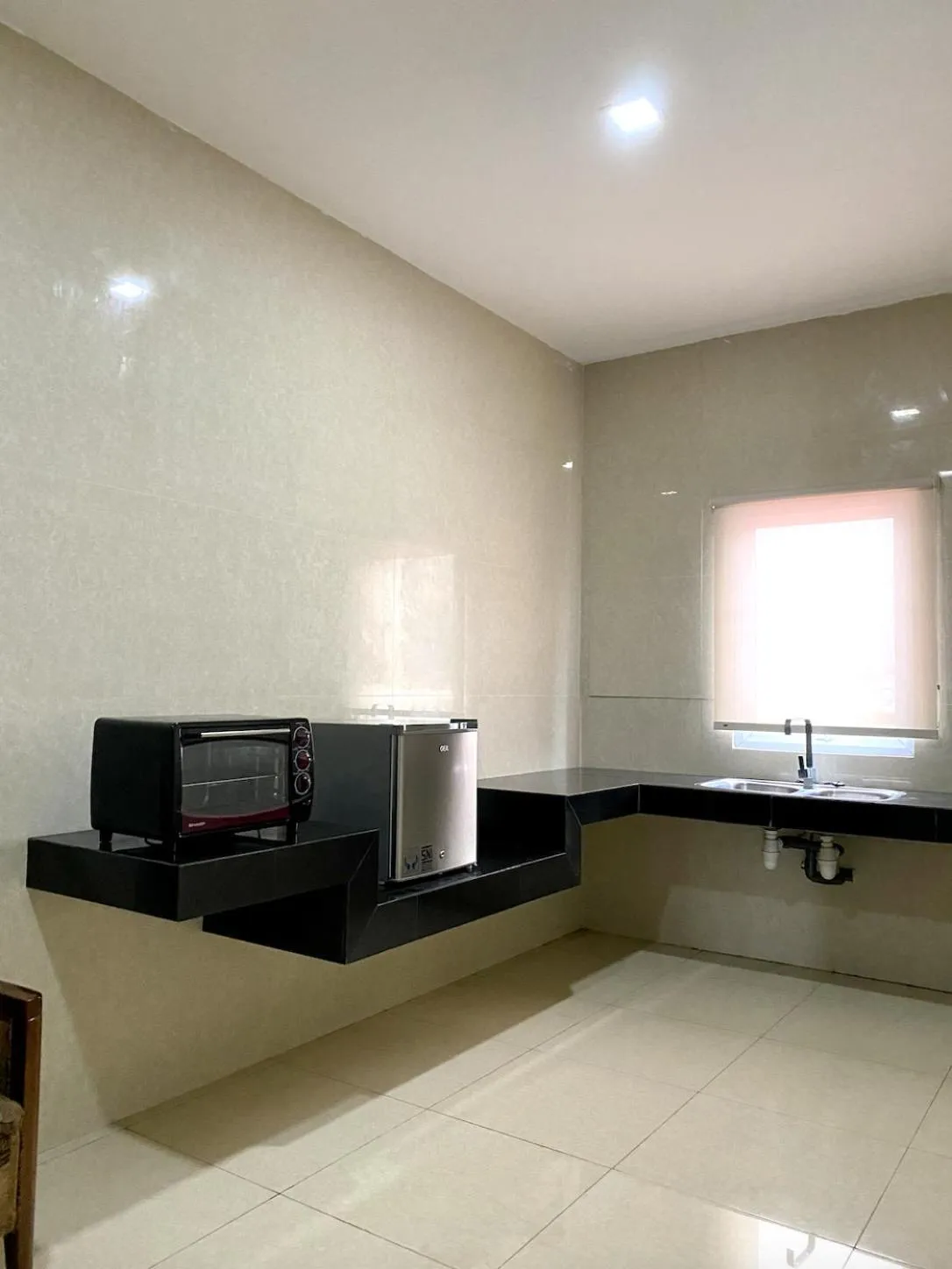 Kitchen or kitchenette in Hans Inn Batam