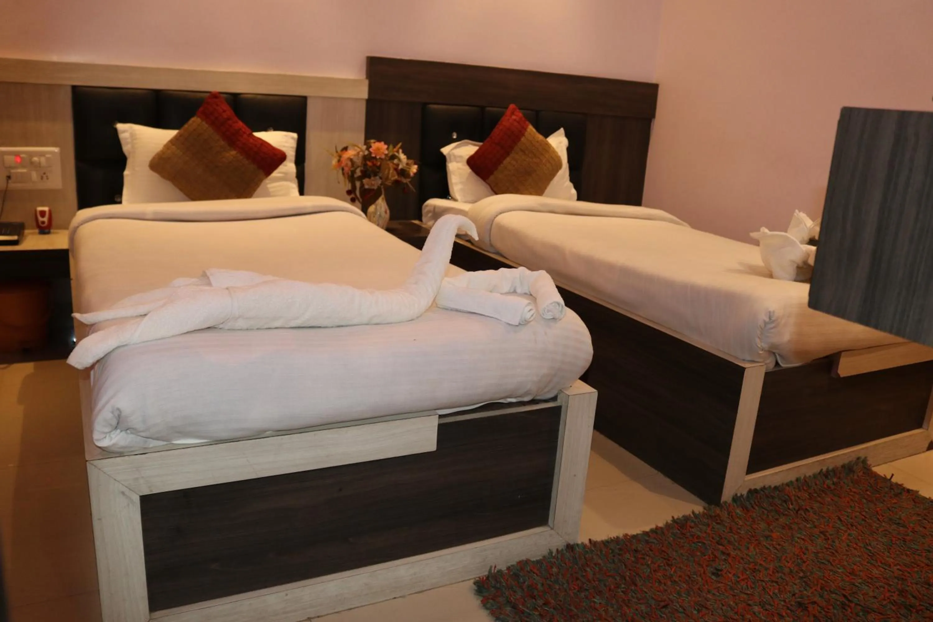 Bed in Hotel Vaishnavi Heights