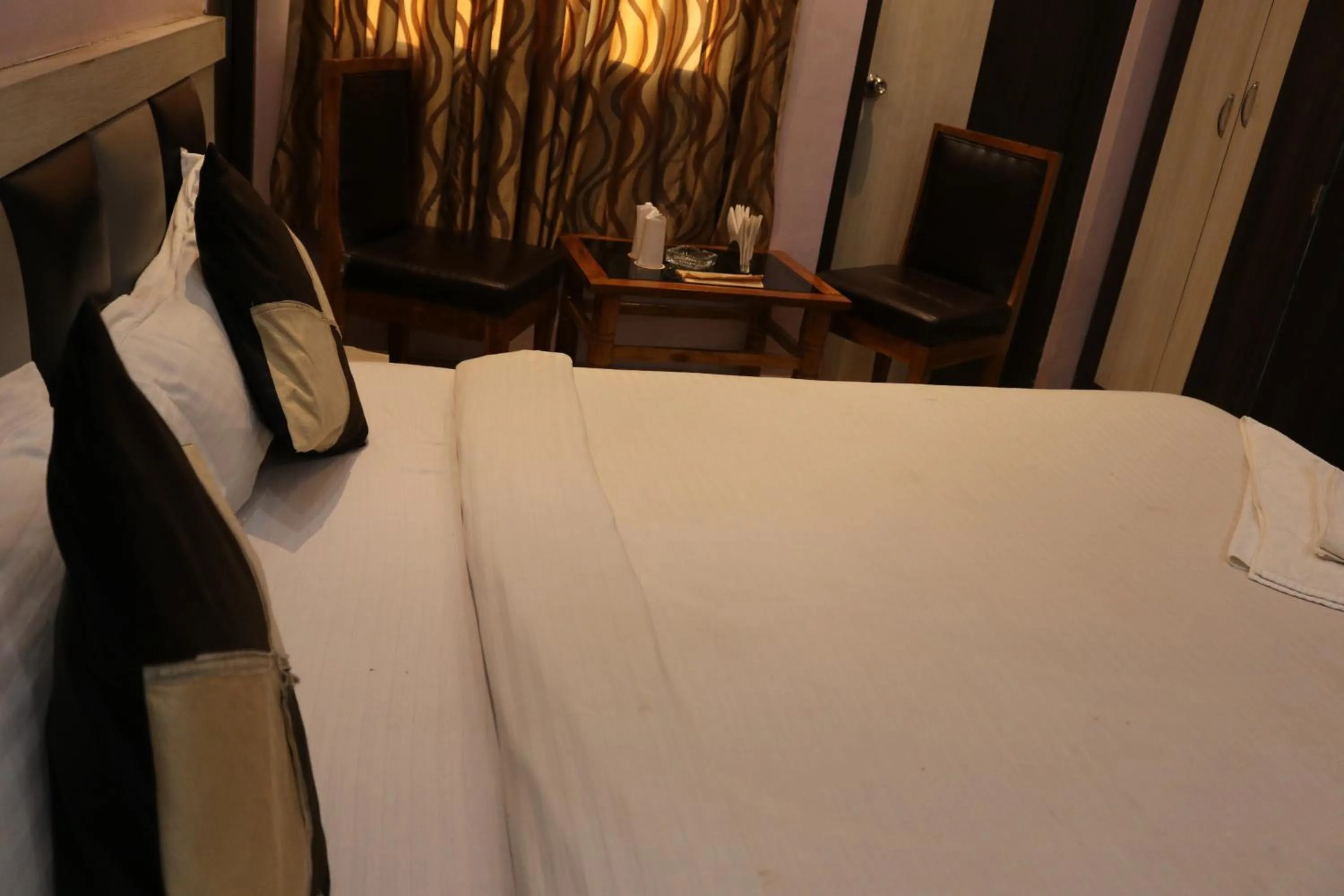 Bed in Hotel Vaishnavi Heights