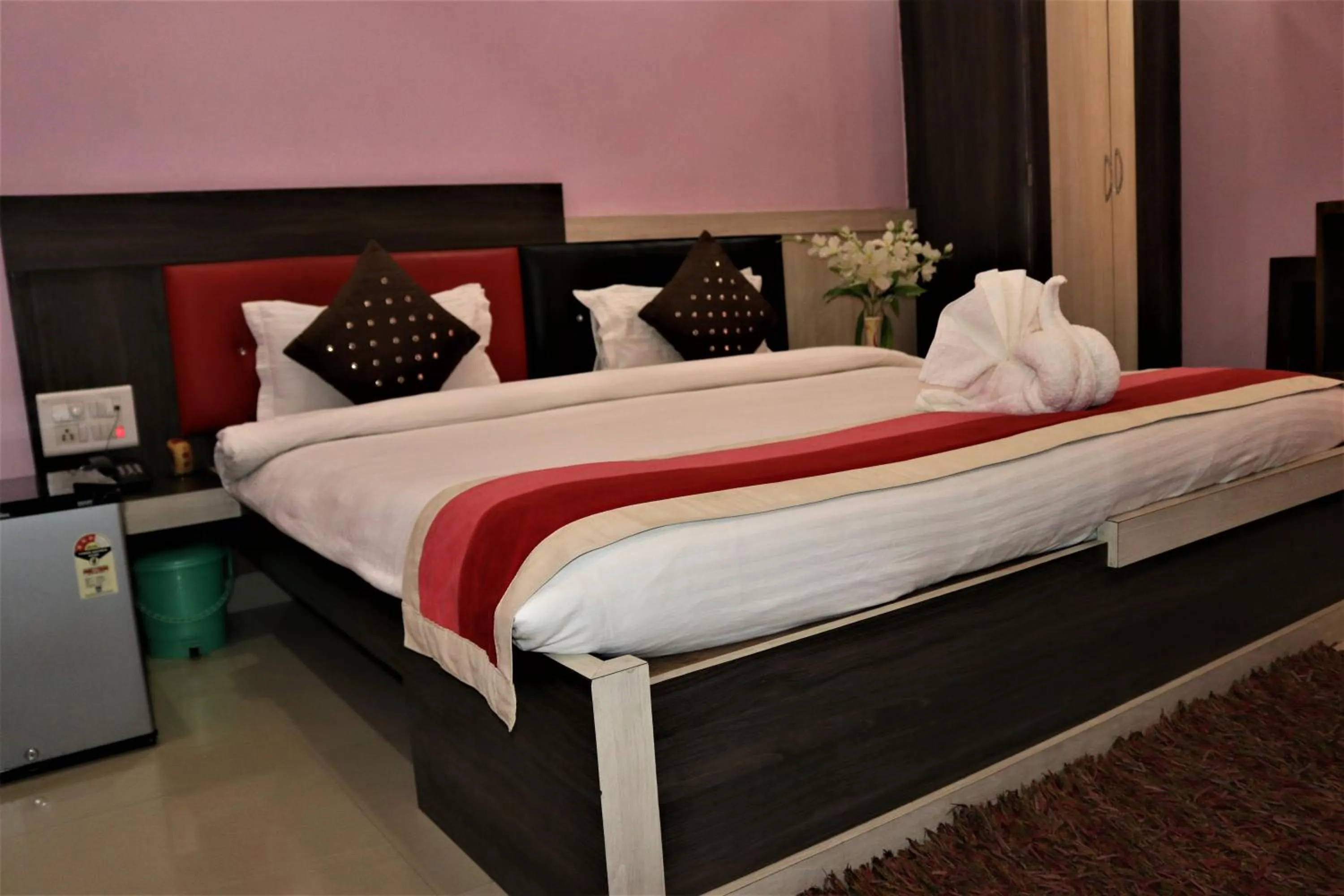 Bed in Hotel Vaishnavi Heights